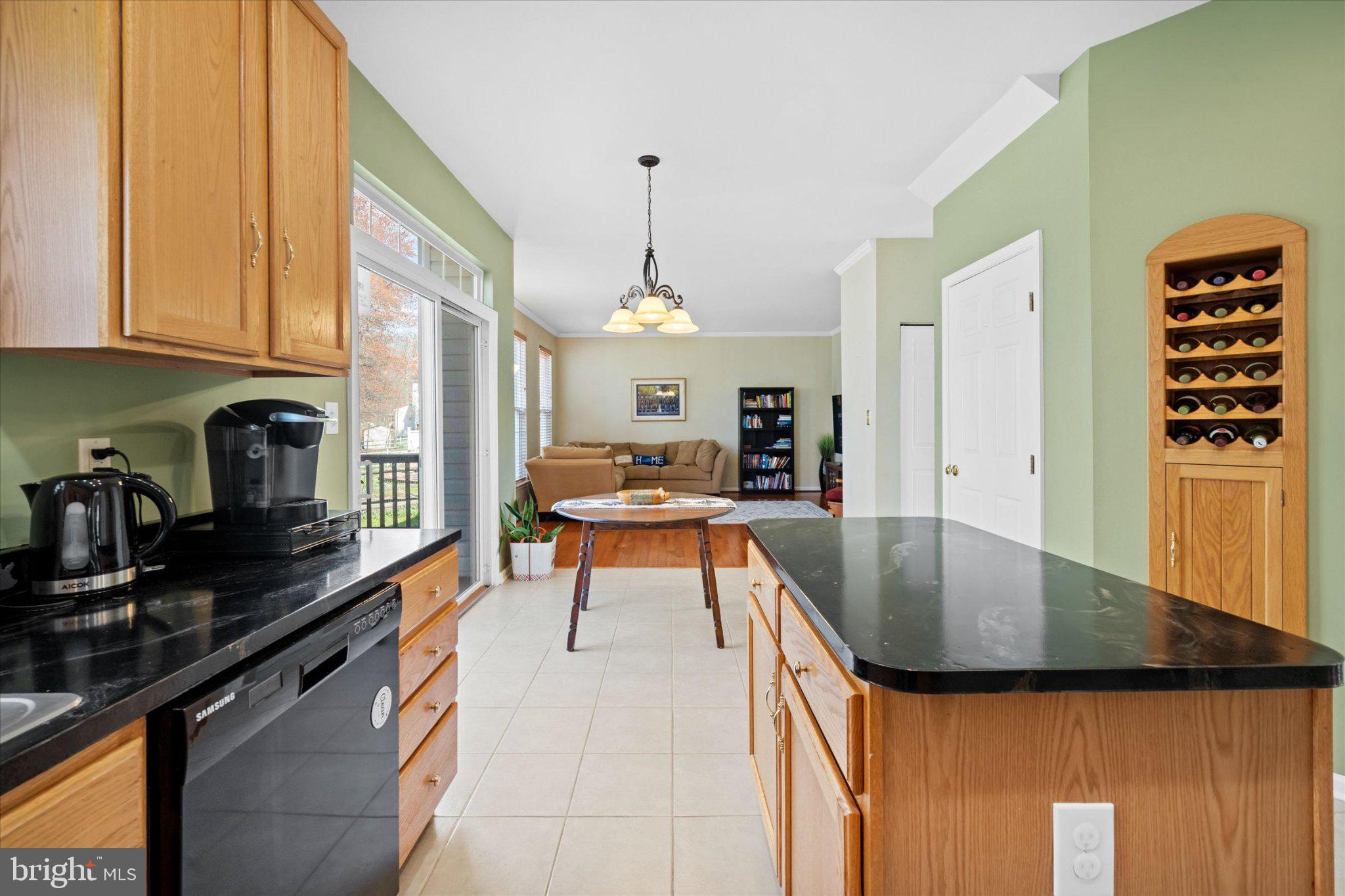 457 Preakness Run Newark, DE 19702 - Photo 36 of 55 a kitchen with stainless steel appliances granite countertop a sink a stove and a refrigerator