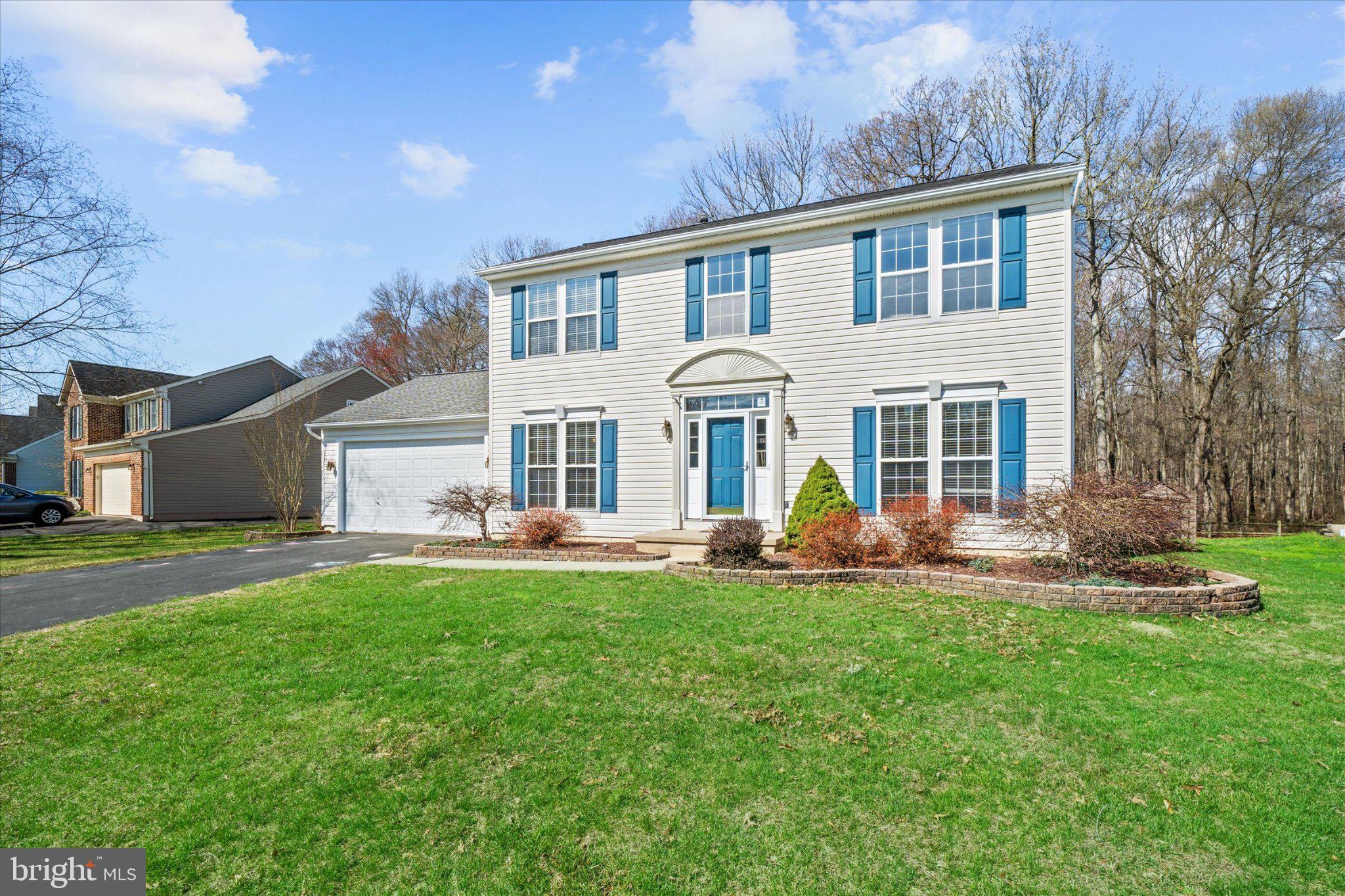 457 Preakness Run Newark, DE 19702 - Photo 4 of 55 a front view of a house with a yard