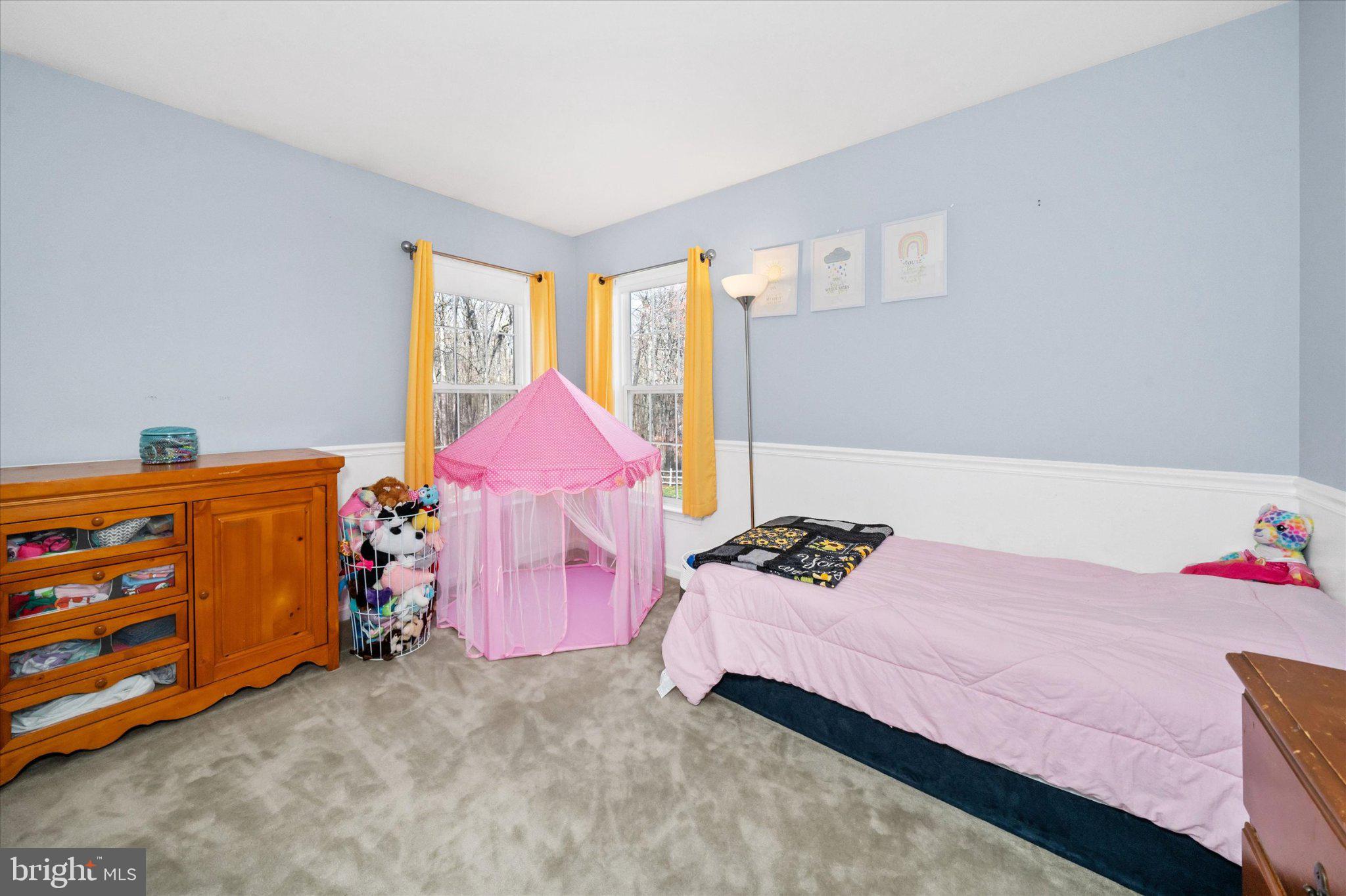 457 Preakness Run Newark, DE 19702 - Photo 42 of 55 a bedroom with a bed and a dresser