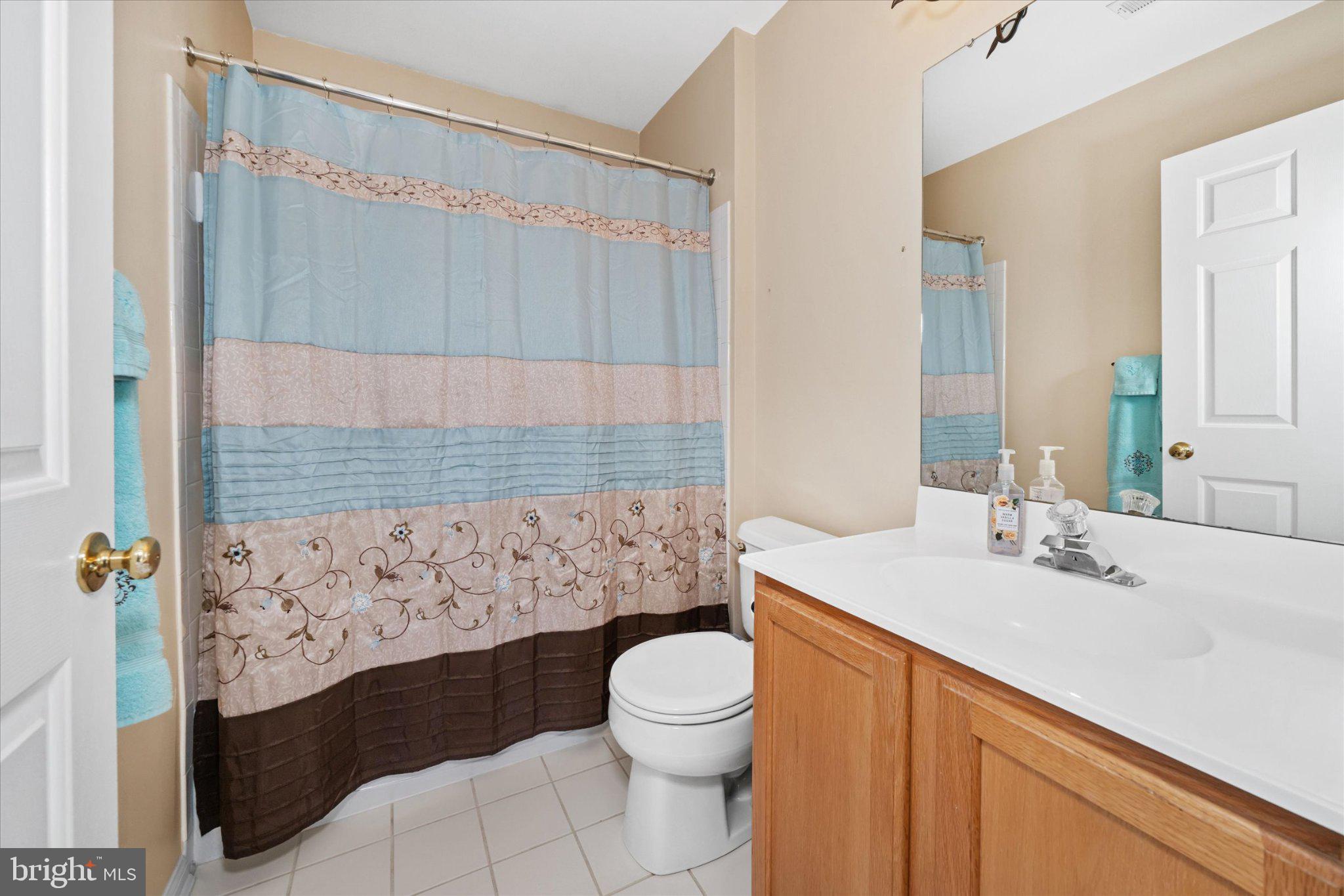457 Preakness Run Newark, DE 19702 - Photo 44 of 55 a bathroom with a sink a toilet and shower