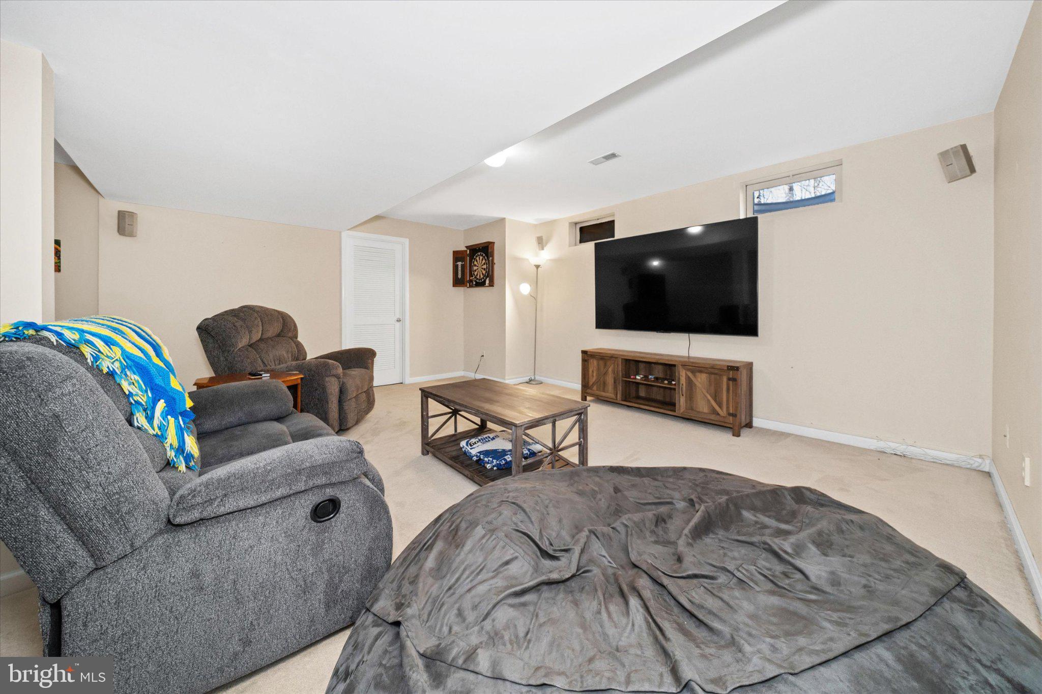 457 Preakness Run Newark, DE 19702 - Photo 53 of 55 a living room with furniture and a flat screen tv
