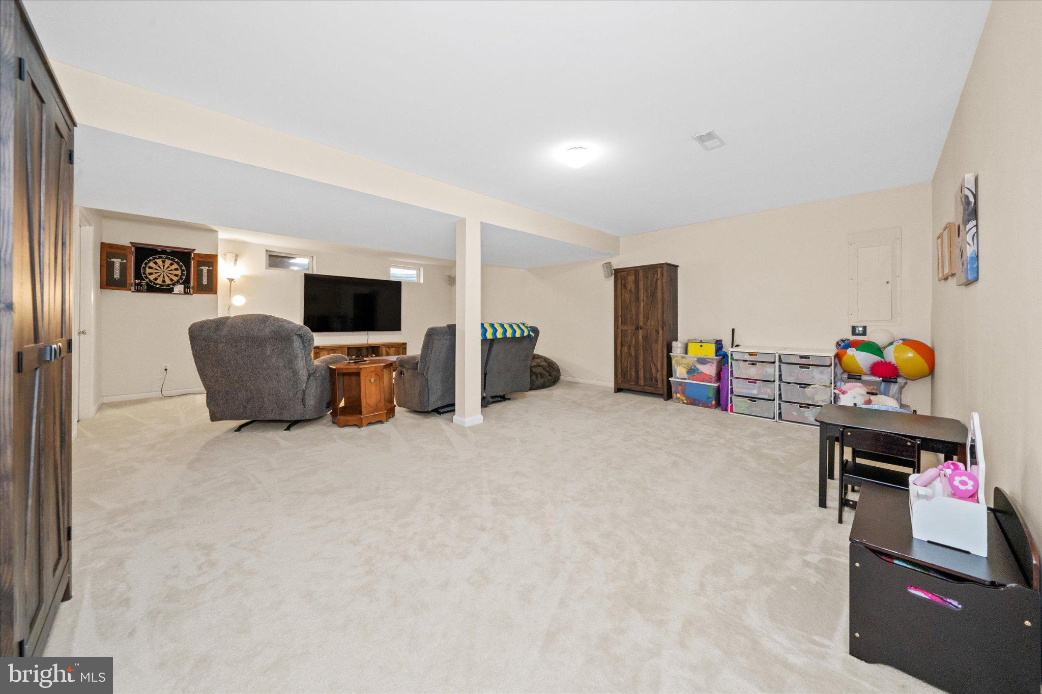 457 Preakness Run Newark, DE 19702 - Photo 54 of 55 a living room with furniture and a flat screen tv