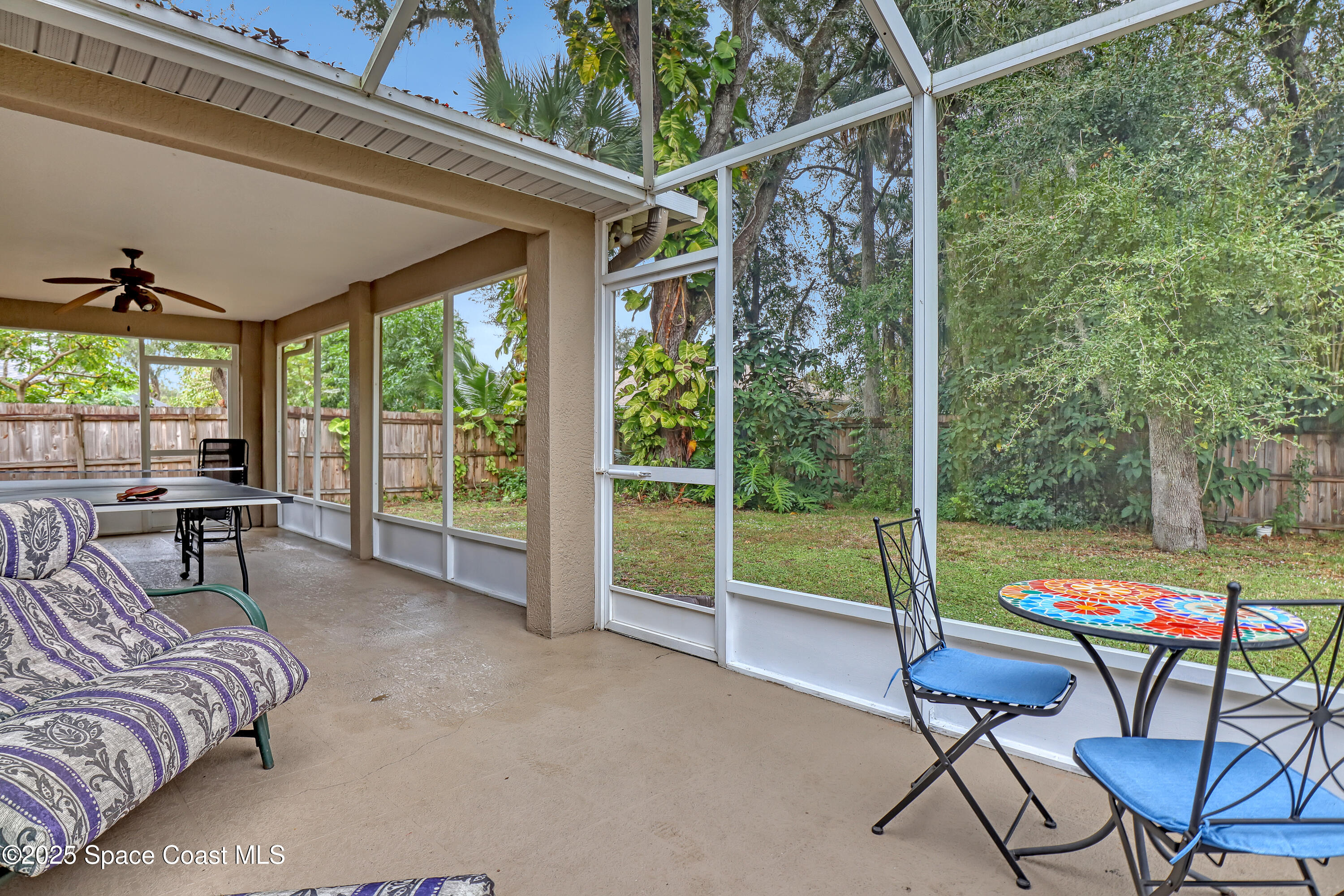 1081 Meadowbrook Road Northeast Palm Bay, FL 32905 - Photo 30 of 37 Screened porch