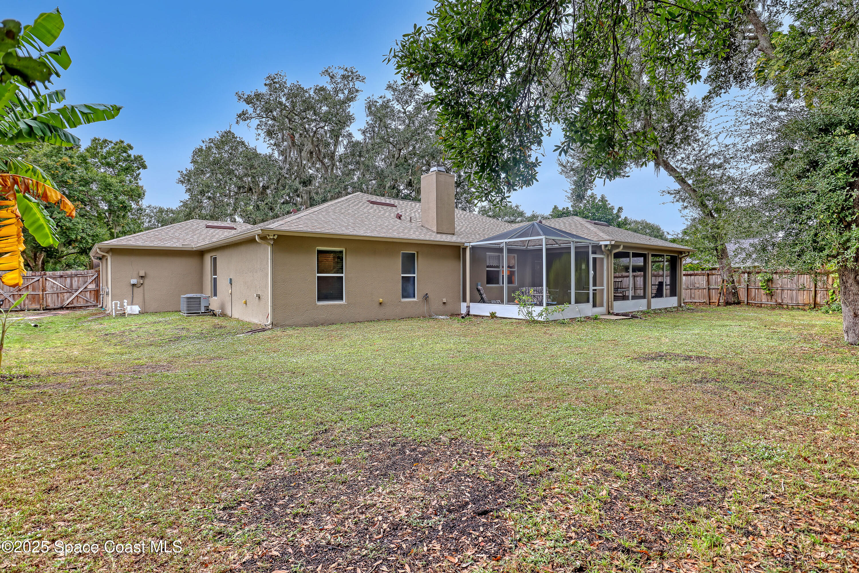 1081 Meadowbrook Road Northeast Palm Bay, FL 32905 - Photo 34 of 38 Backyard 2