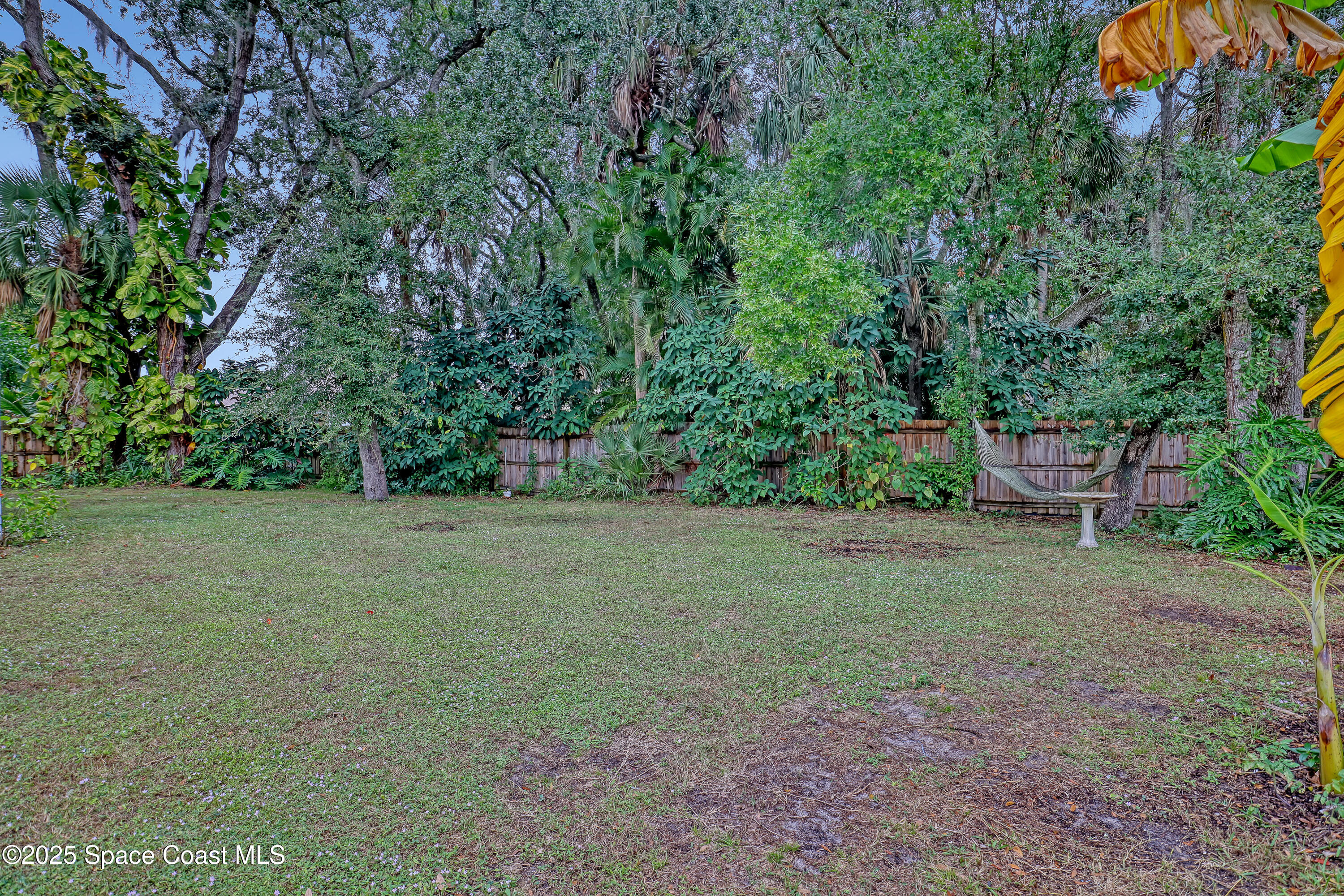 1081 Meadowbrook Road Northeast Palm Bay, FL 32905 - Photo 36 of 38 Fenced-in backyard
