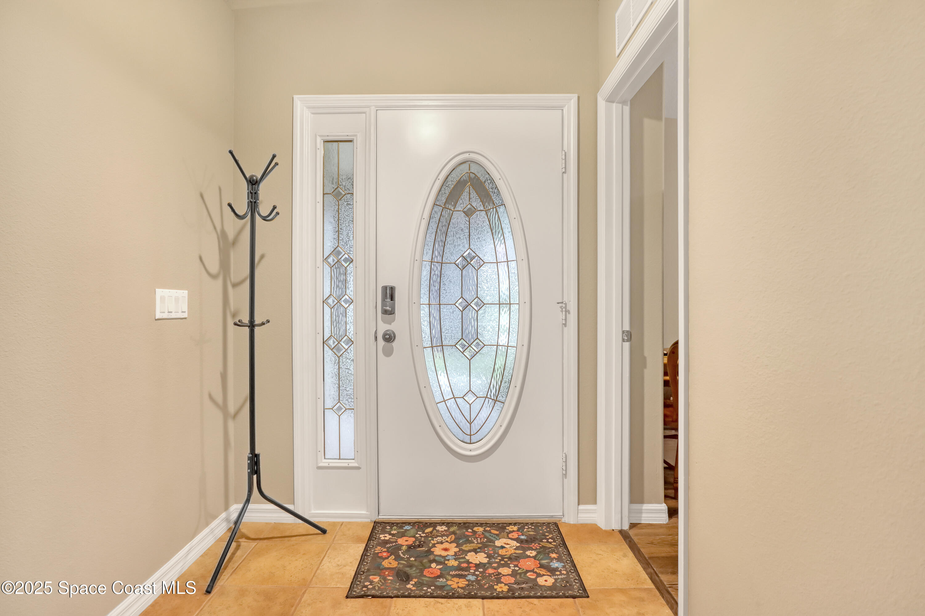 1081 Meadowbrook Road Northeast Palm Bay, FL 32905 - Photo 6 of 37 Foyer