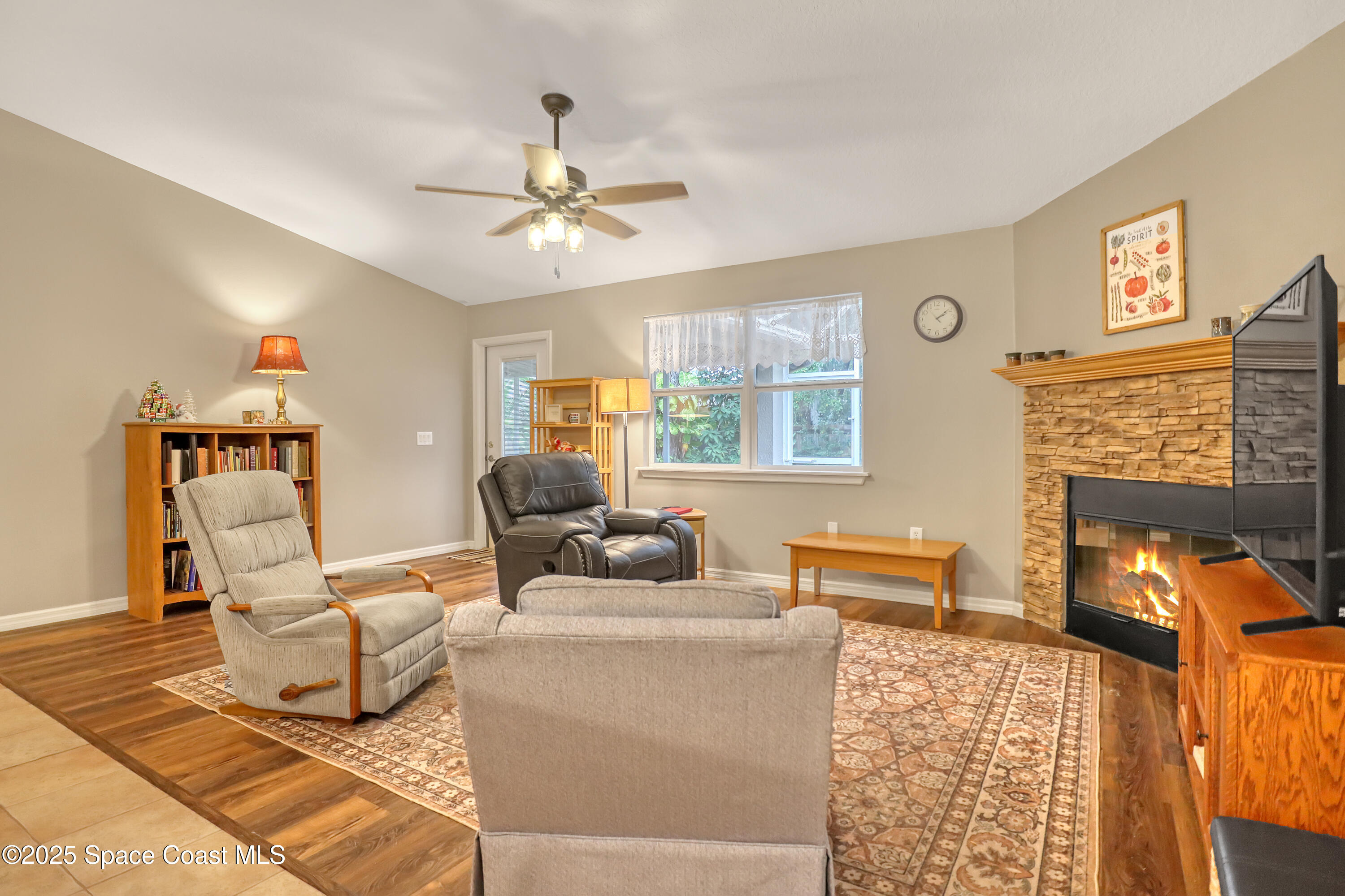1081 Meadowbrook Road Northeast Palm Bay, FL 32905 - Photo 9 of 37 Family room to back porch 1