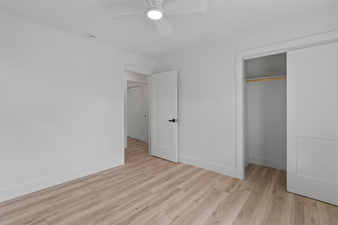 5604 Overbrook Drive Austin, TX 78723 - Photo 28 of 34 a view of an empty room with wooden floor