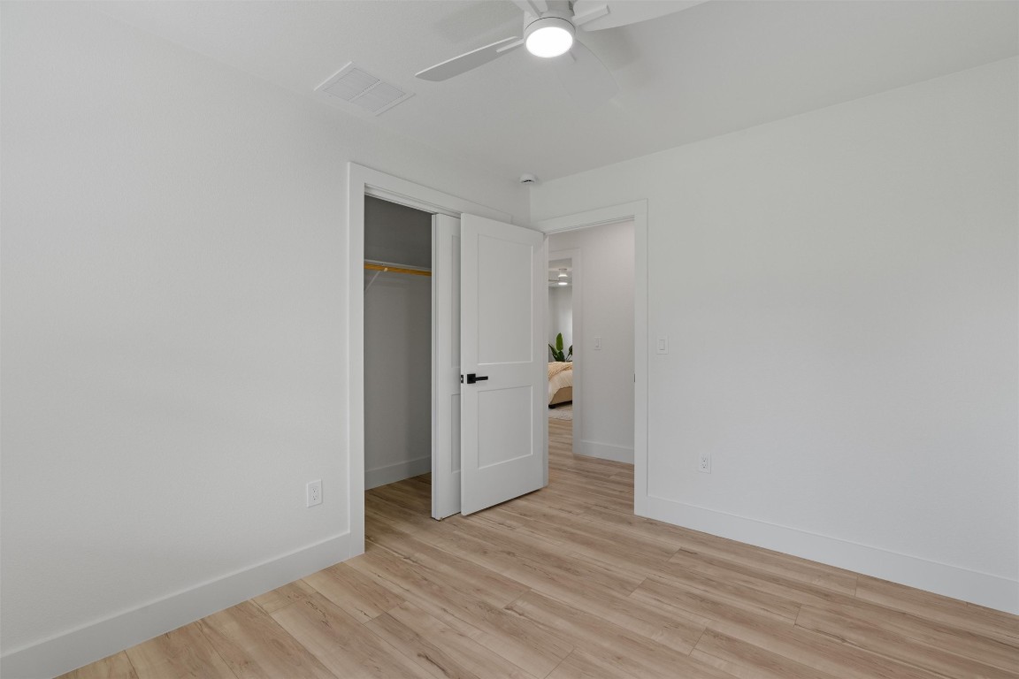 5604 Overbrook Drive Austin, TX 78723 - Photo 32 of 34 a view of an empty room with wooden floor