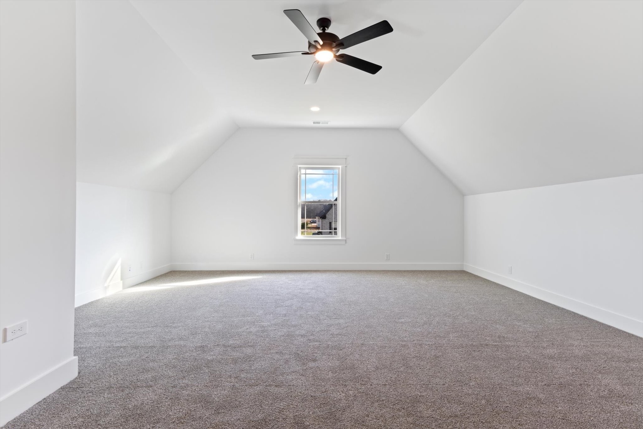 2704 Carousel Drive Murfreesboro, TN 37128 - Photo 13 of 17 an empty room with a window and a ceiling fan