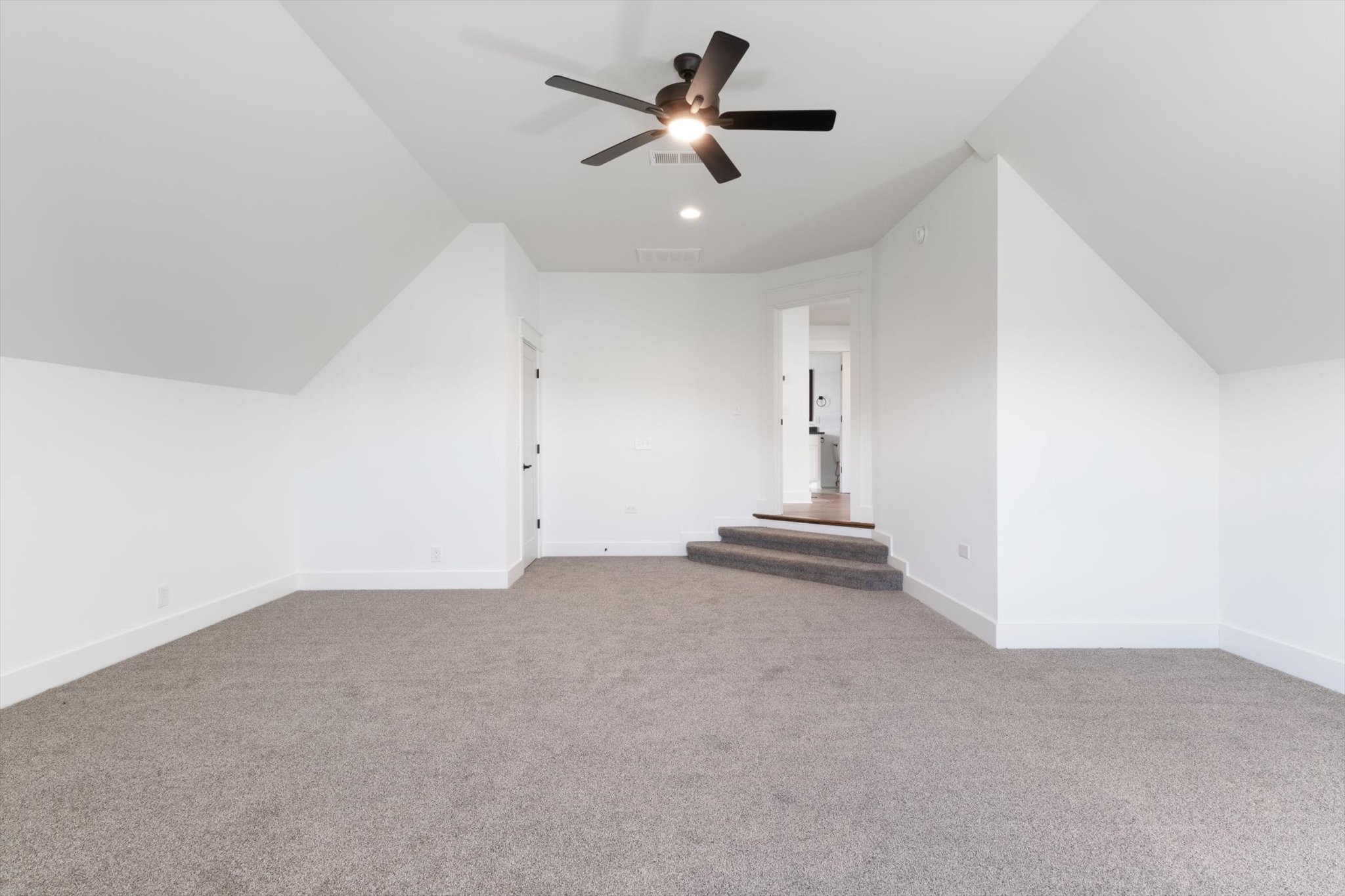 2704 Carousel Drive Murfreesboro, TN 37128 - Photo 14 of 17 an empty room with a ceiling fan and window