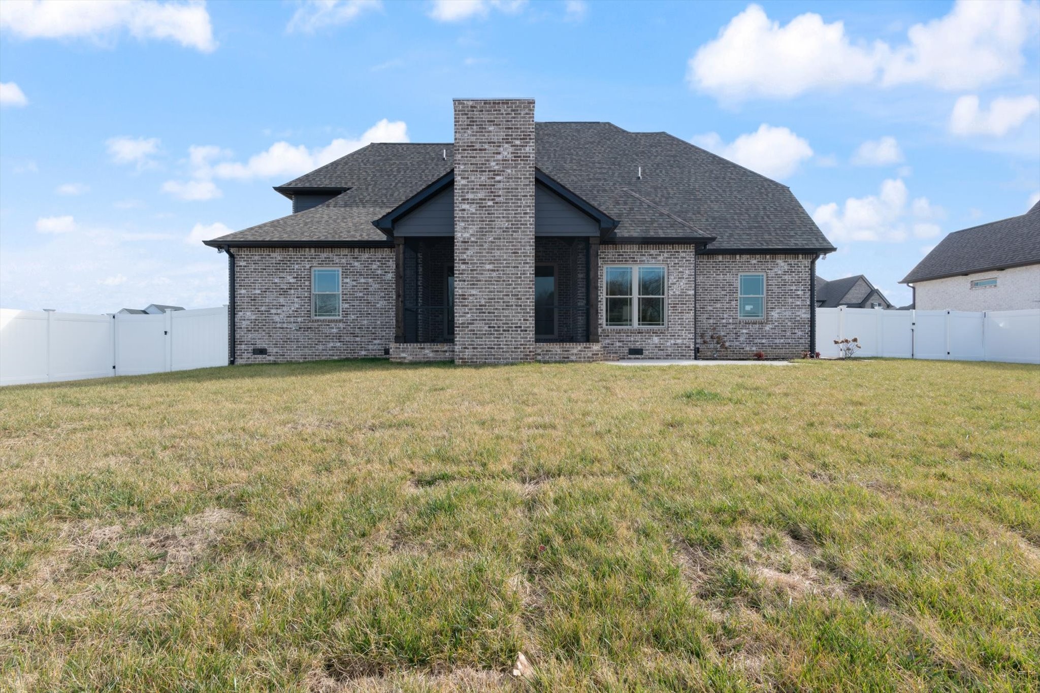 2704 Carousel Drive Murfreesboro, TN 37128 - Photo 17 of 17 a view of a brick house with a big yard