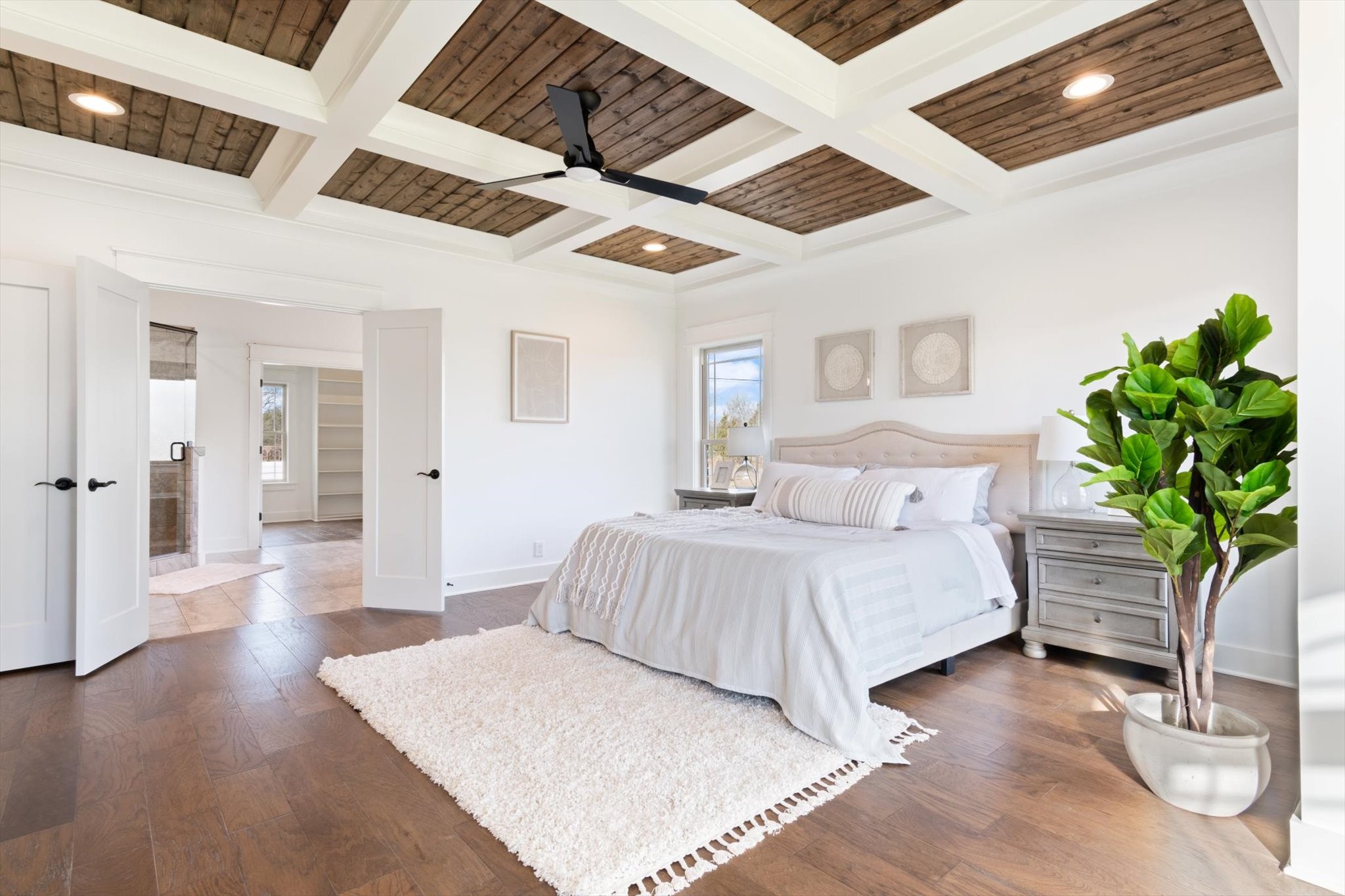 2704 Carousel Drive Murfreesboro, TN 37128 - Photo 9 of 17 a spacious bedroom with a bed and a potted plant