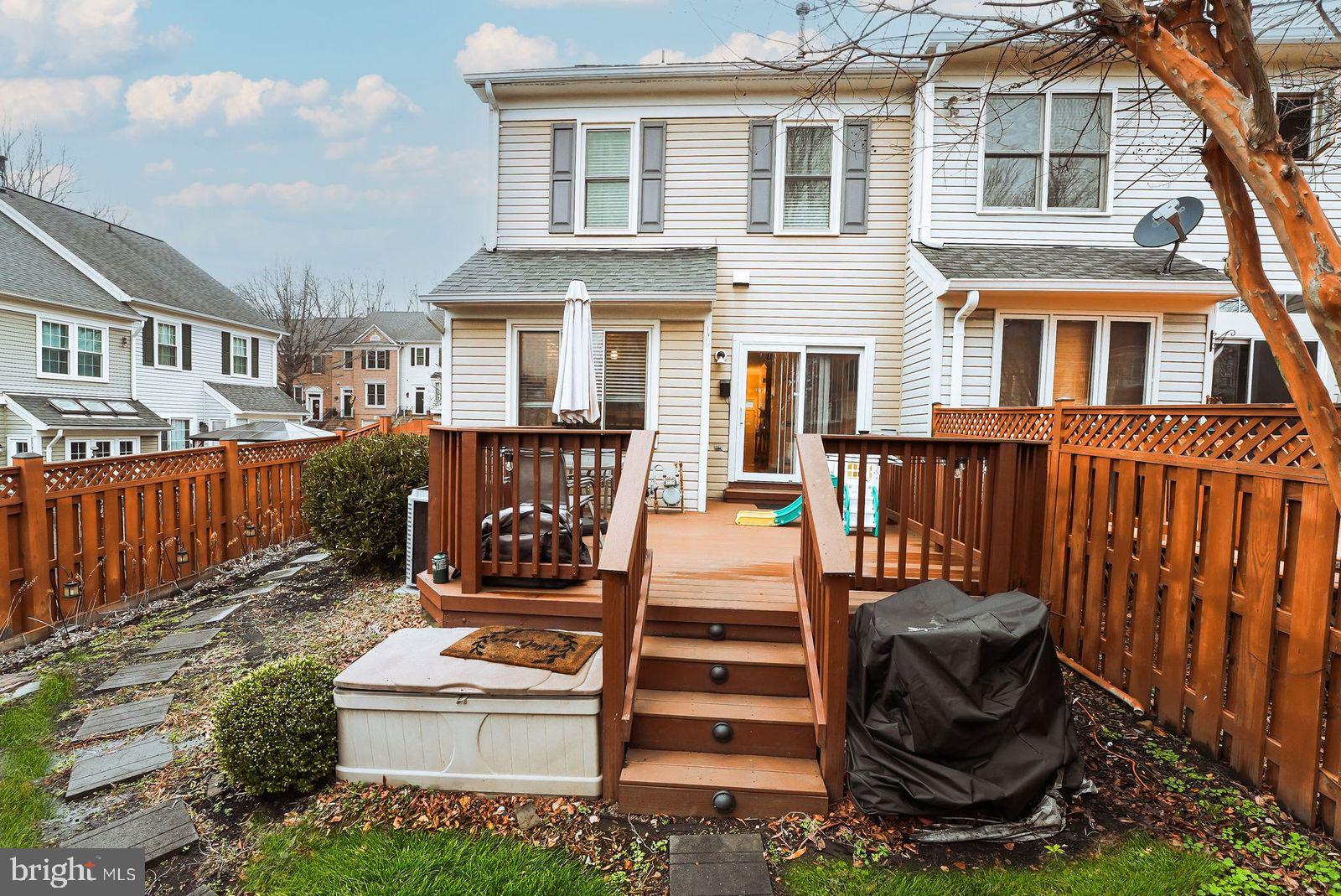 3643 Ransom Place Alexandria, VA 22306 - Photo 12 of 13 a front view of a house with barbeque grill and iron fence