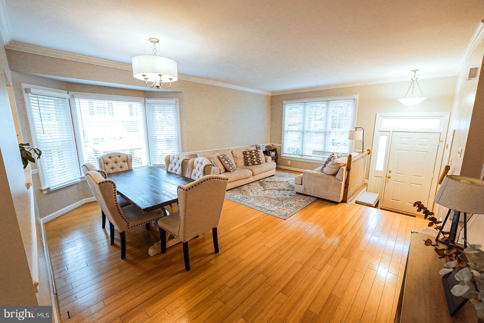 3643 Ransom Place Alexandria, VA 22306 - Photo 7 of 13 a view of a dining room with furniture window and wooden floor