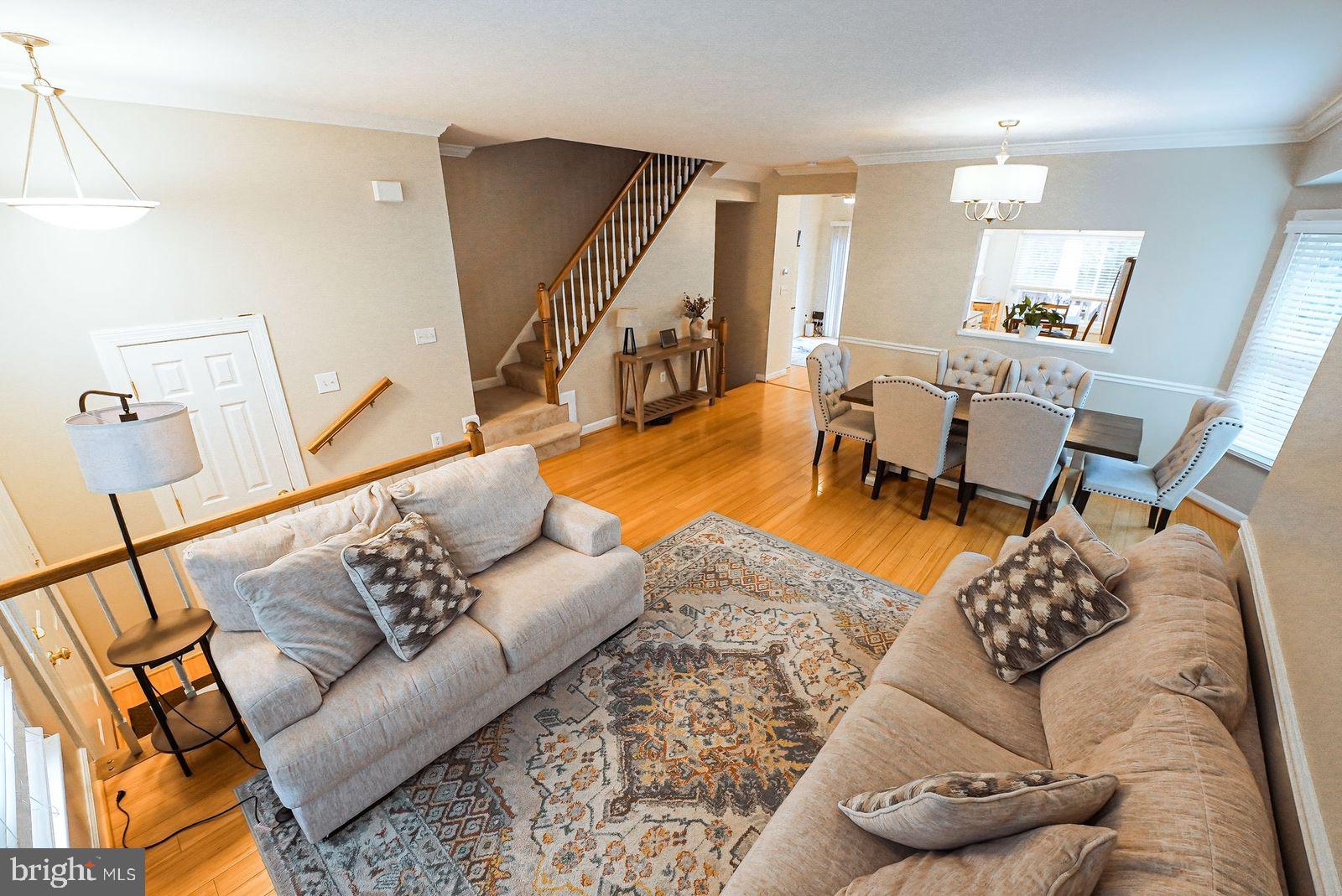 3643 Ransom Place Alexandria, VA 22306 - Photo 8 of 13 a living room with furniture and a wooden floor