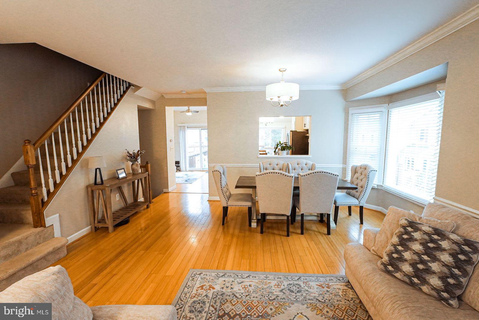 3643 Ransom Place Alexandria, VA 22306 - Photo 10 of 13 a view of a dining room with furniture window and wooden floor