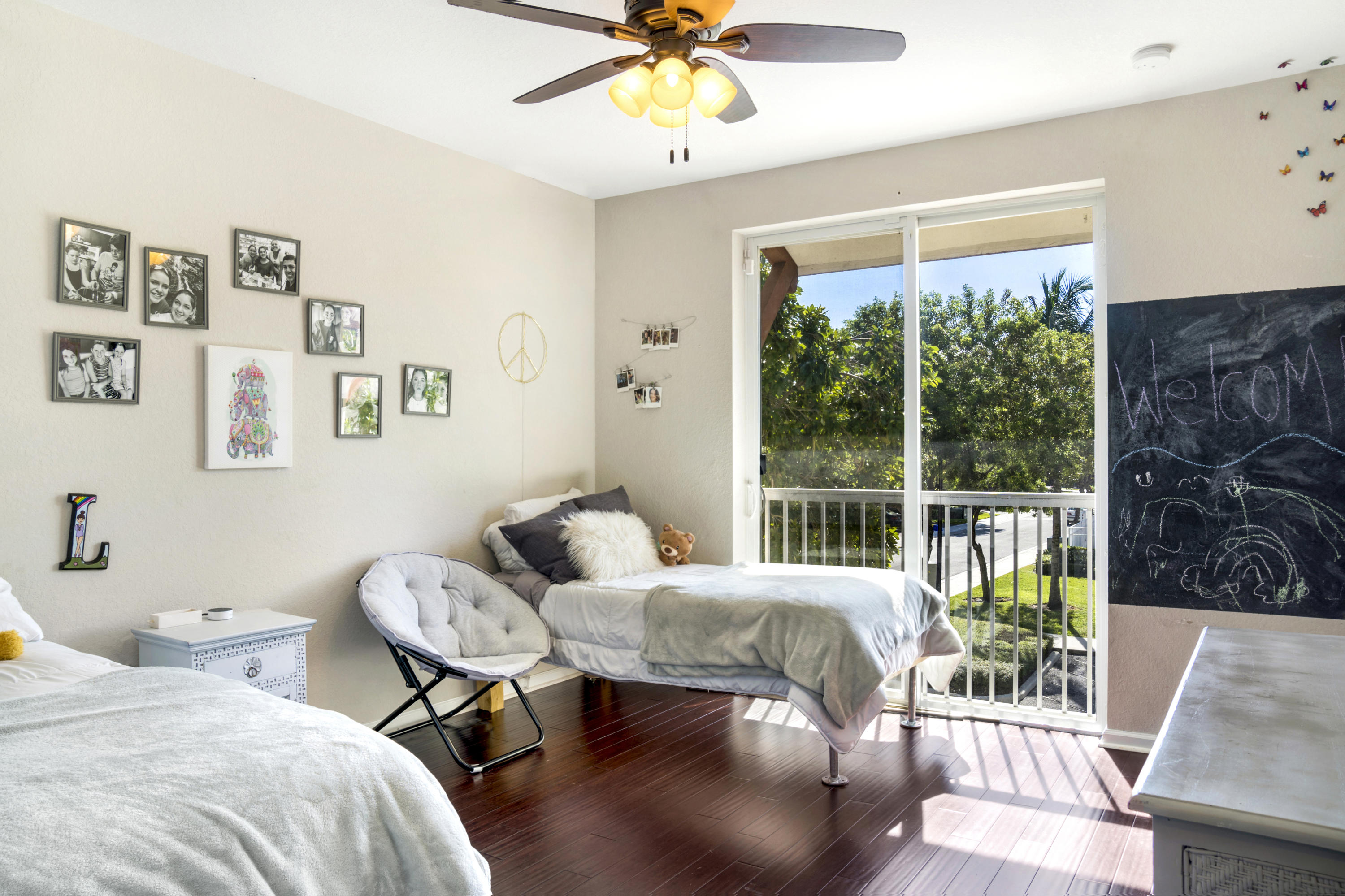 4719 North Prive Circle Delray Beach, FL 33445 - Photo 16 of 23 a living room with furniture and a large window