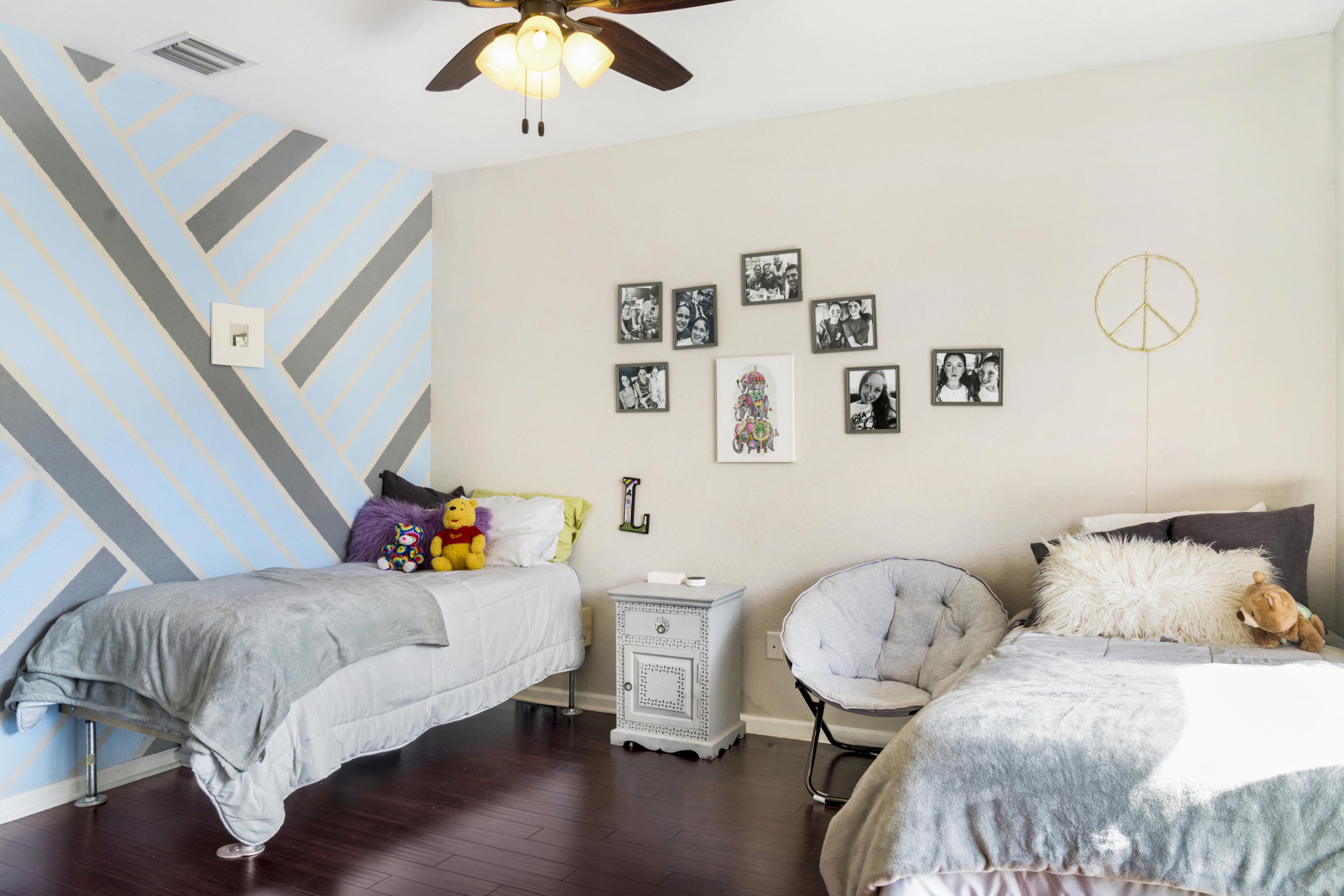 4719 North Prive Circle Delray Beach, FL 33445 - Photo 17 of 23 a bedroom with furniture and a baby crib