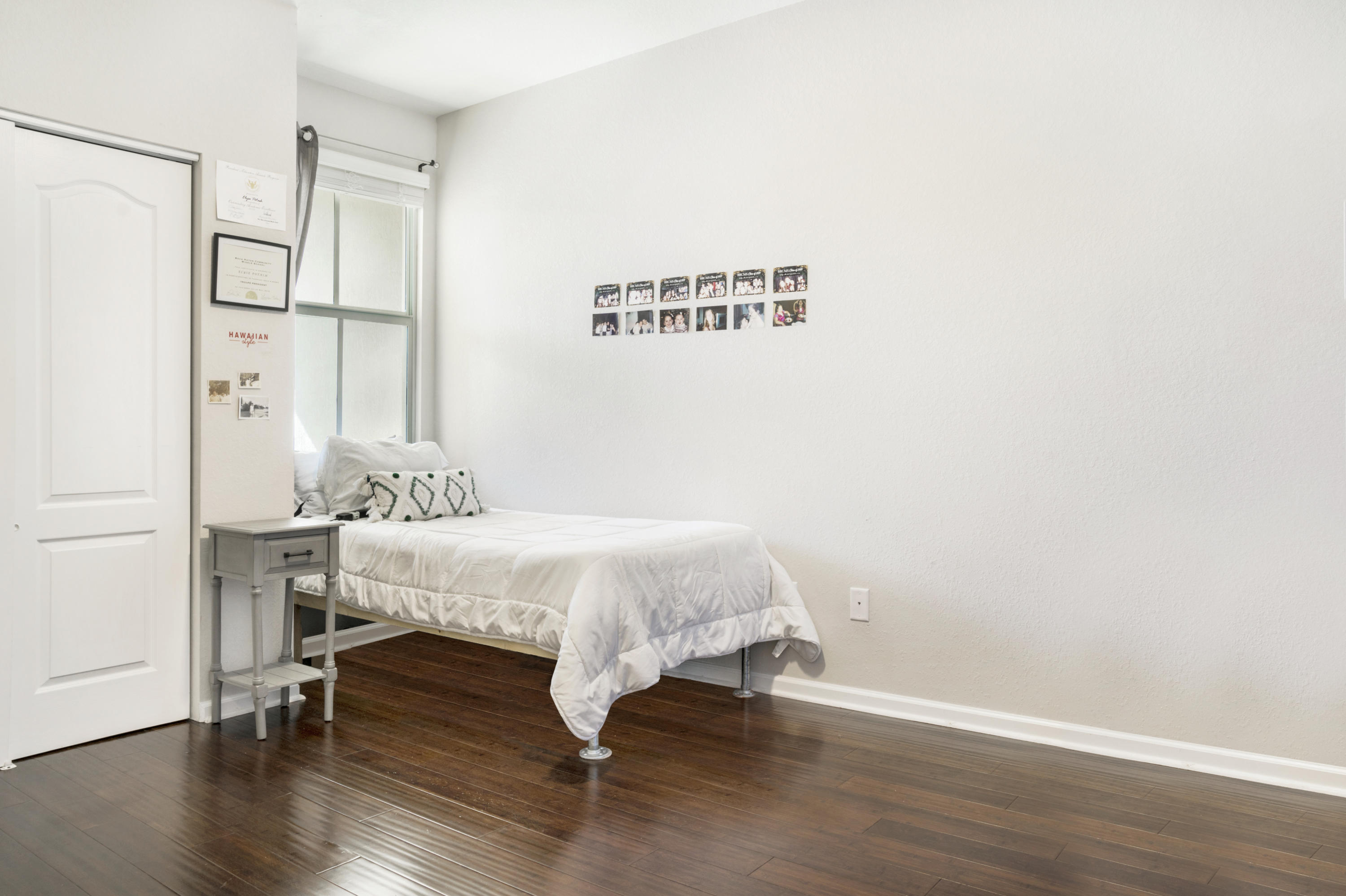 4719 North Prive Circle Delray Beach, FL 33445 - Photo 19 of 23 a bed room with a bed and a table