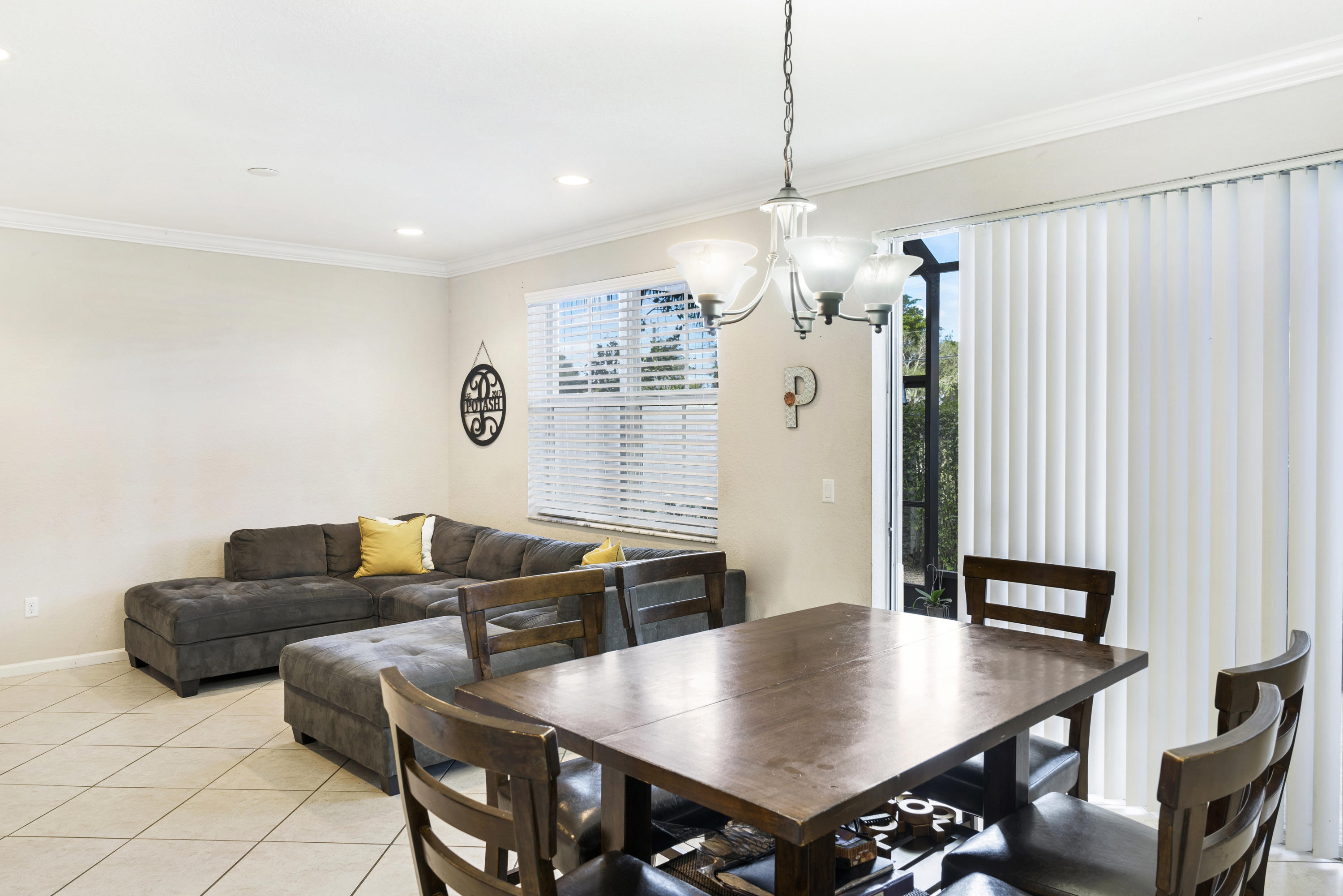 4719 North Prive Circle Delray Beach, FL 33445 - Photo 8 of 23 a view of a dining room with furniture