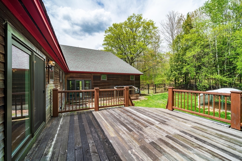 184 W Road Bernardston, MA 01337 - Photo 9 of 41 a view of house with deck and wooden floor