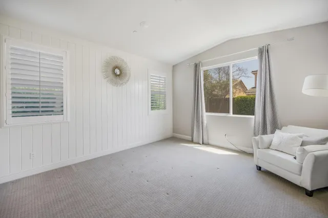 a view of livingroom with furniture and window