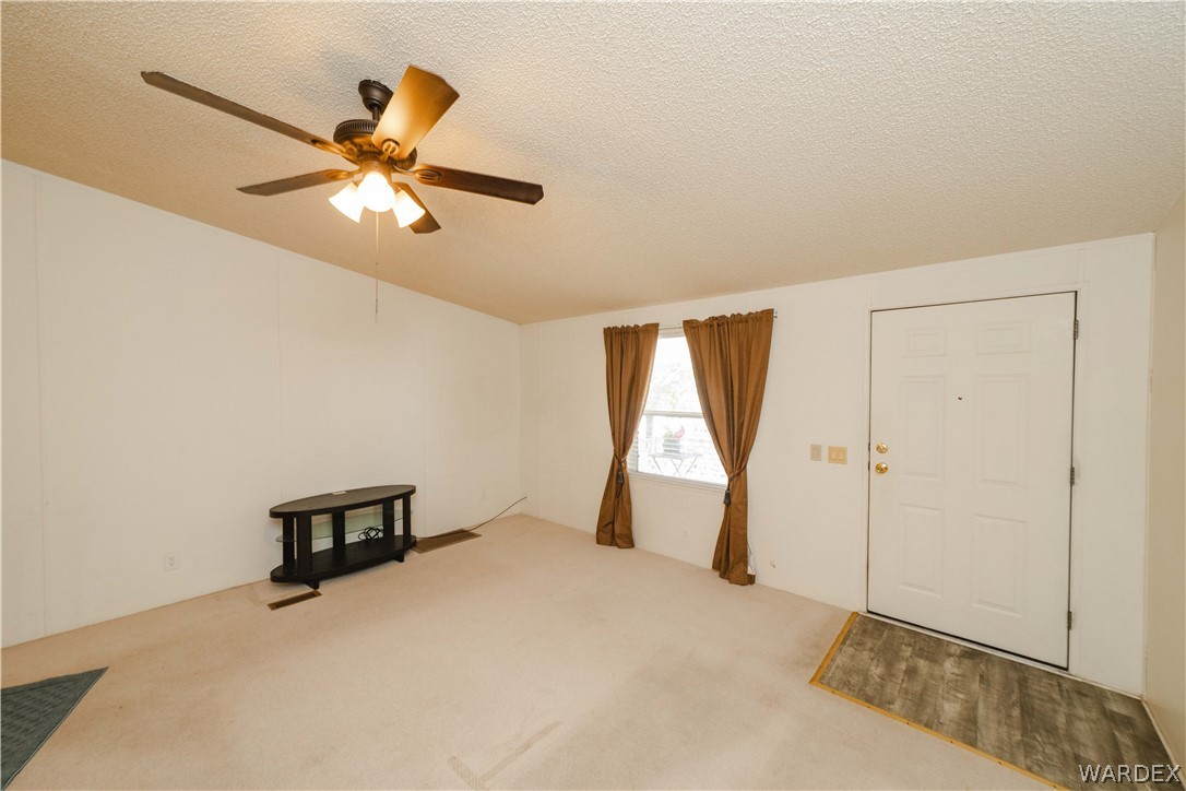 3003 Hualapai Mountain Road Kingman, AZ 86401 - Photo 5 of 49 a view of an empty room with a window