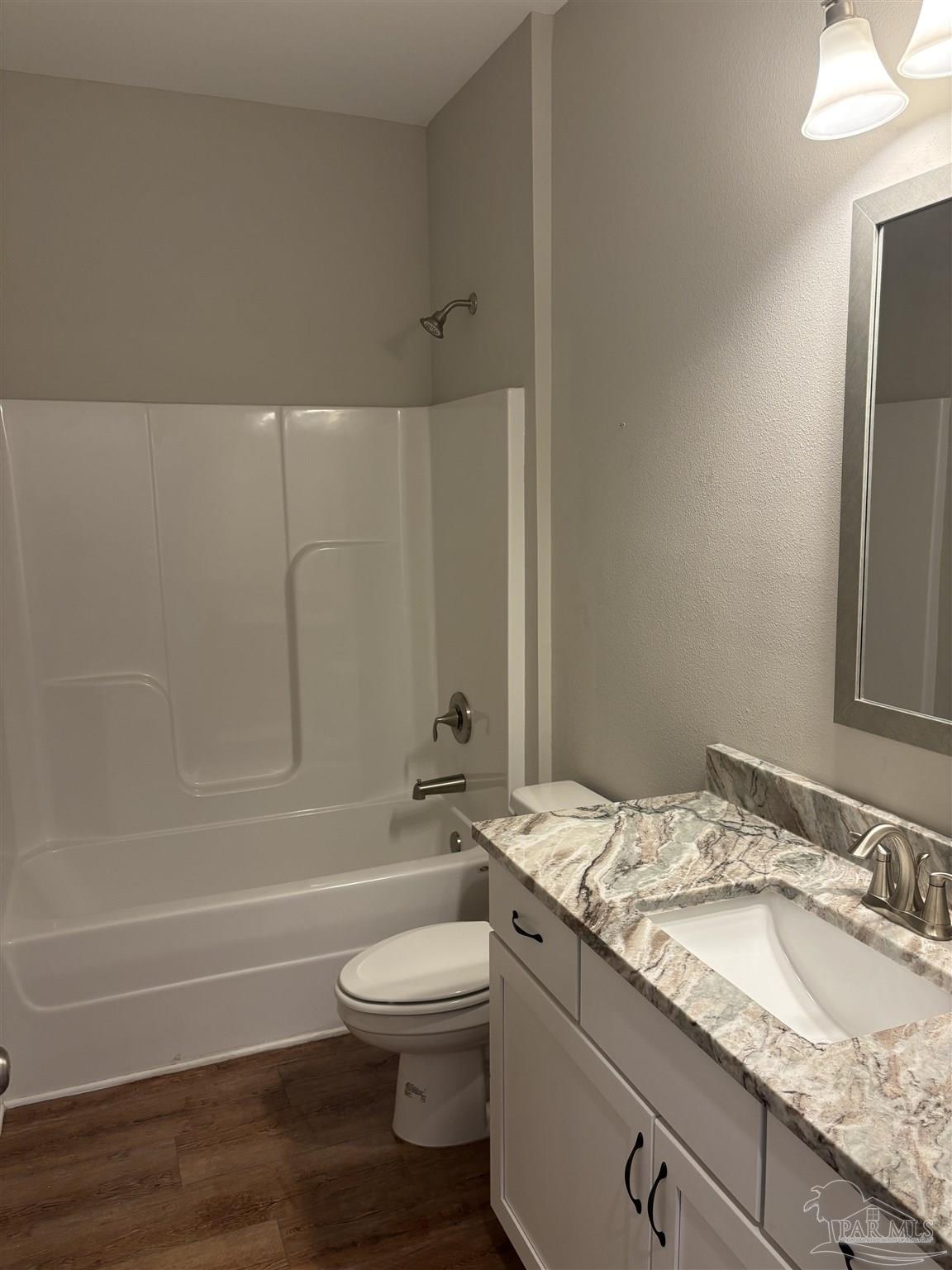 400 Broadleaf Circle Cantonment, FL 32533 - Photo 15 of 21 a bathroom with a granite countertop bathtub shower sink vanity and toilet