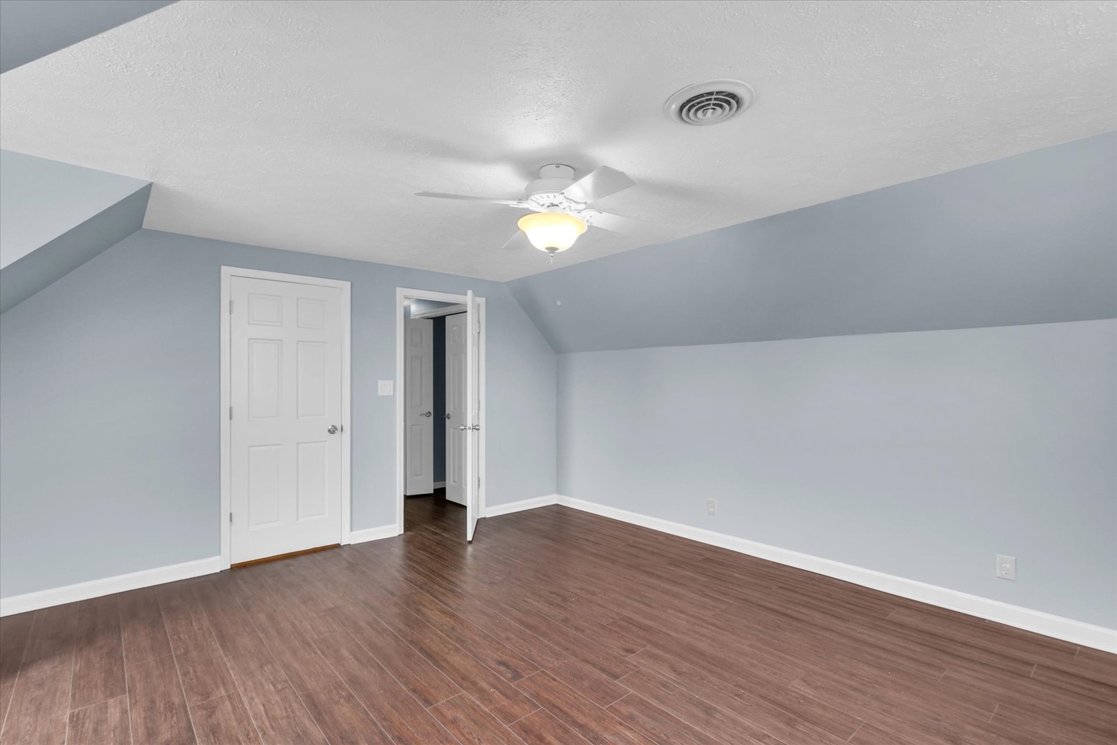 2302 Pheasant Ridge Road Mahomet, IL 61853 - Photo 23 of 31 a view of an empty room with wooden floor
