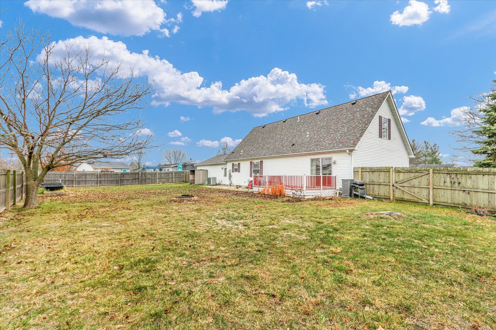 2302 Pheasant Ridge Road Mahomet, IL 61853 - Photo 26 of 31 a view of a house with a yard