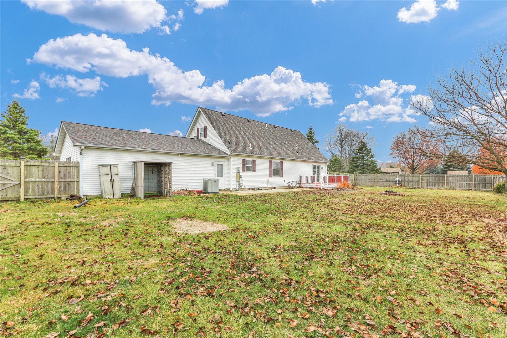 2302 Pheasant Ridge Road Mahomet, IL 61853 - Photo 28 of 31 a house view with a garden space
