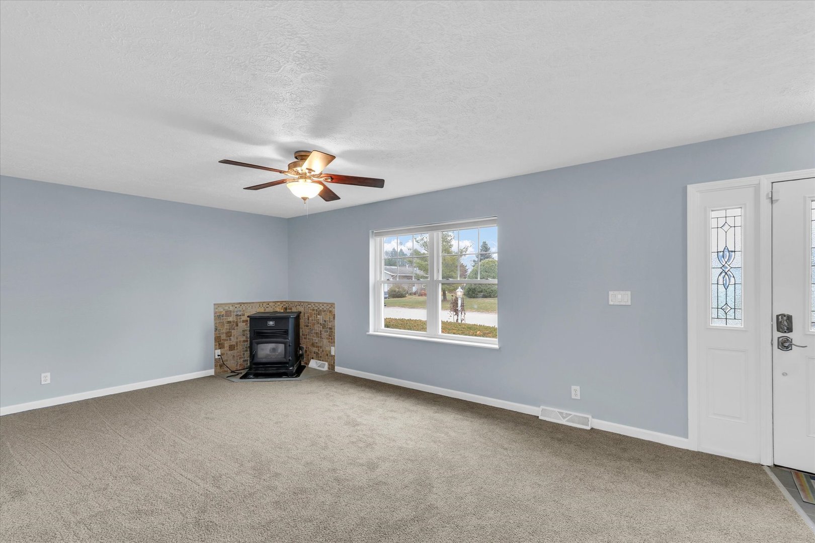 2302 Pheasant Ridge Road Mahomet, IL 61853 - Photo 6 of 31 a view of an empty room with a window
