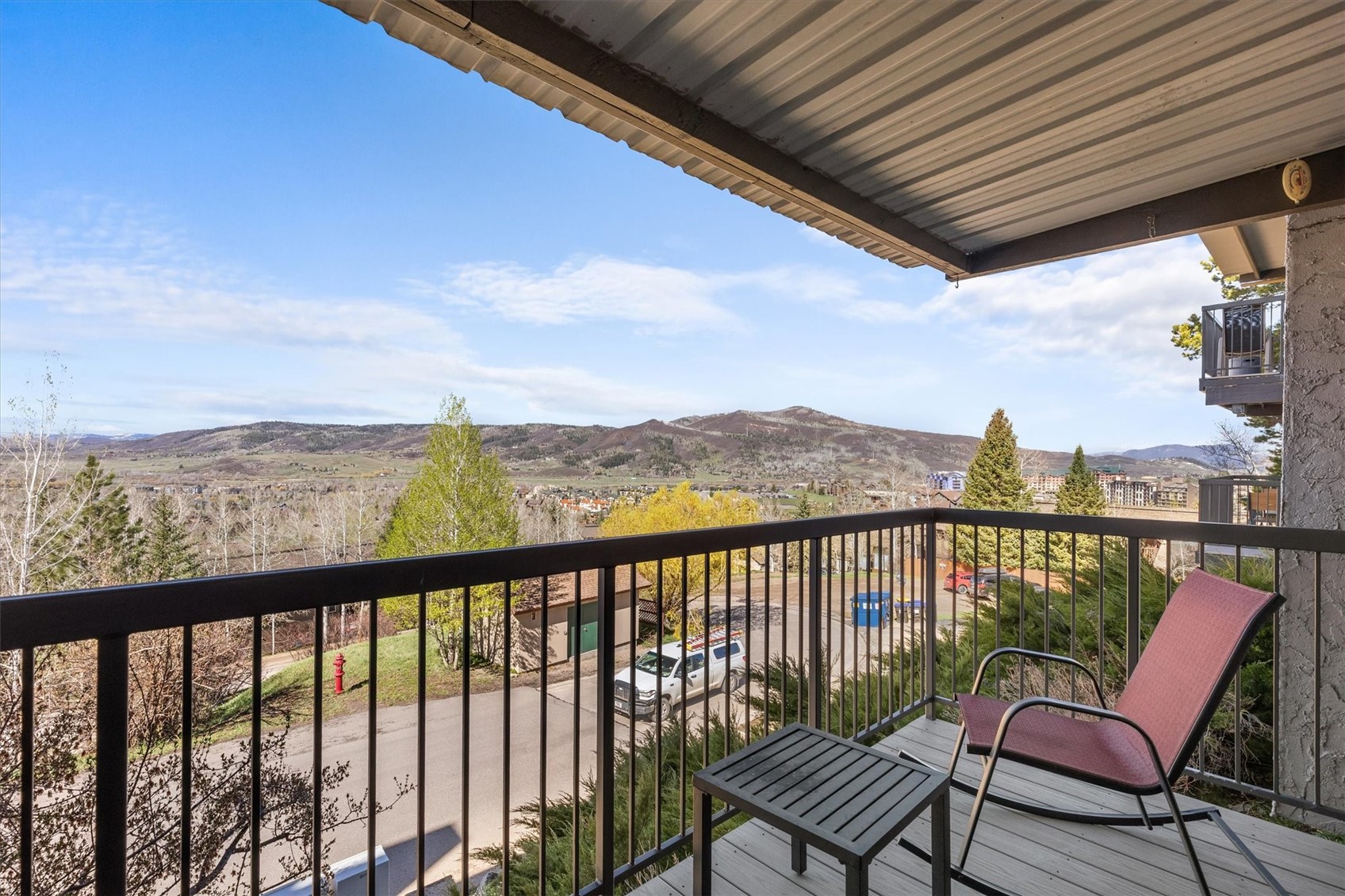2602 Longthong Road, Unit 107 Steamboat Springs, CO 80487 - Photo 2 of 32 a view of a chairs in balcony