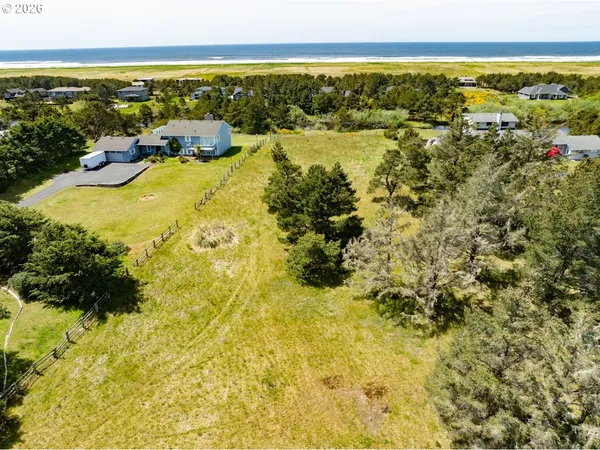 an aerial view of residential houses with swimming pool