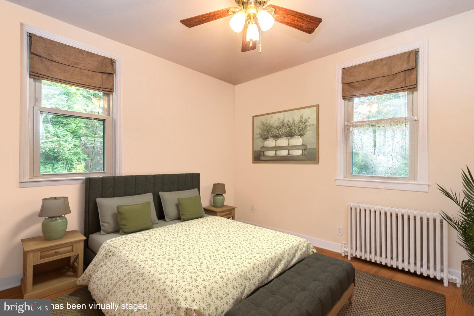 534 Pinney Road Huntingdon Valley, PA 19006 - Photo 13 of 26 a bedroom with a bed and a window