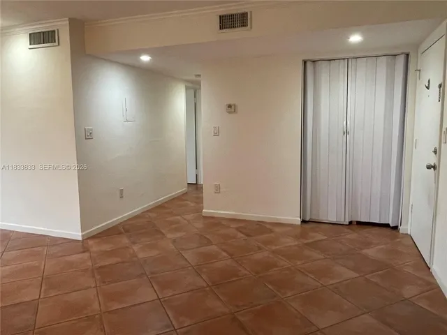 a view of a room with an empty space