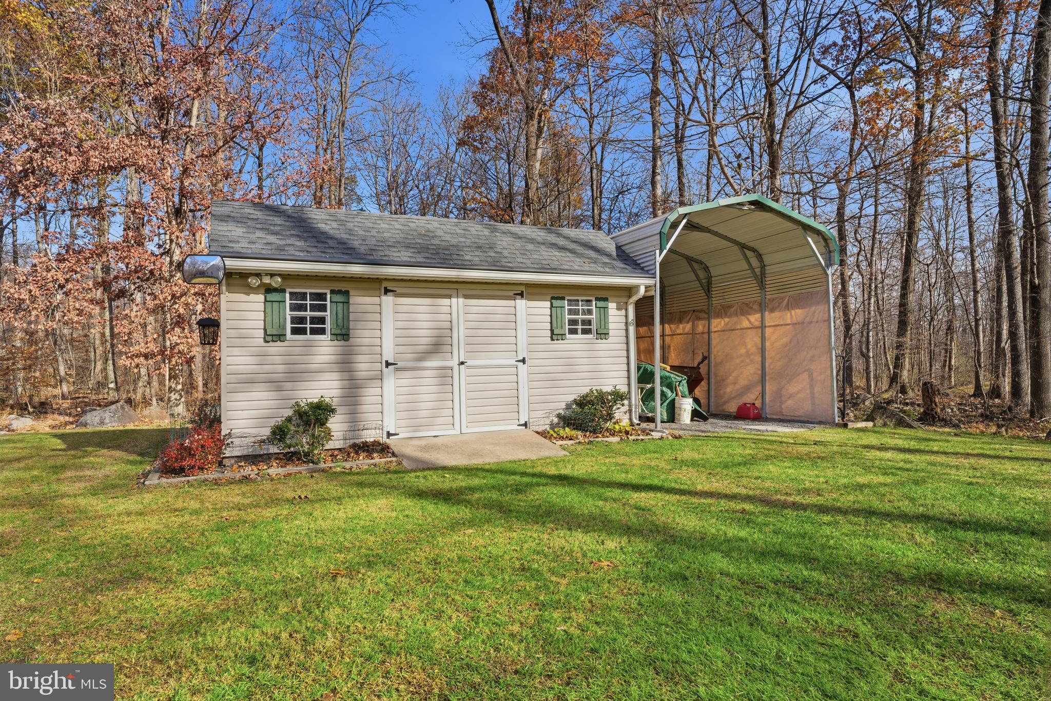 52 Harrisburg School Road Quakertown, PA 18951 - Photo 17 of 32 a front view of a house with a yard