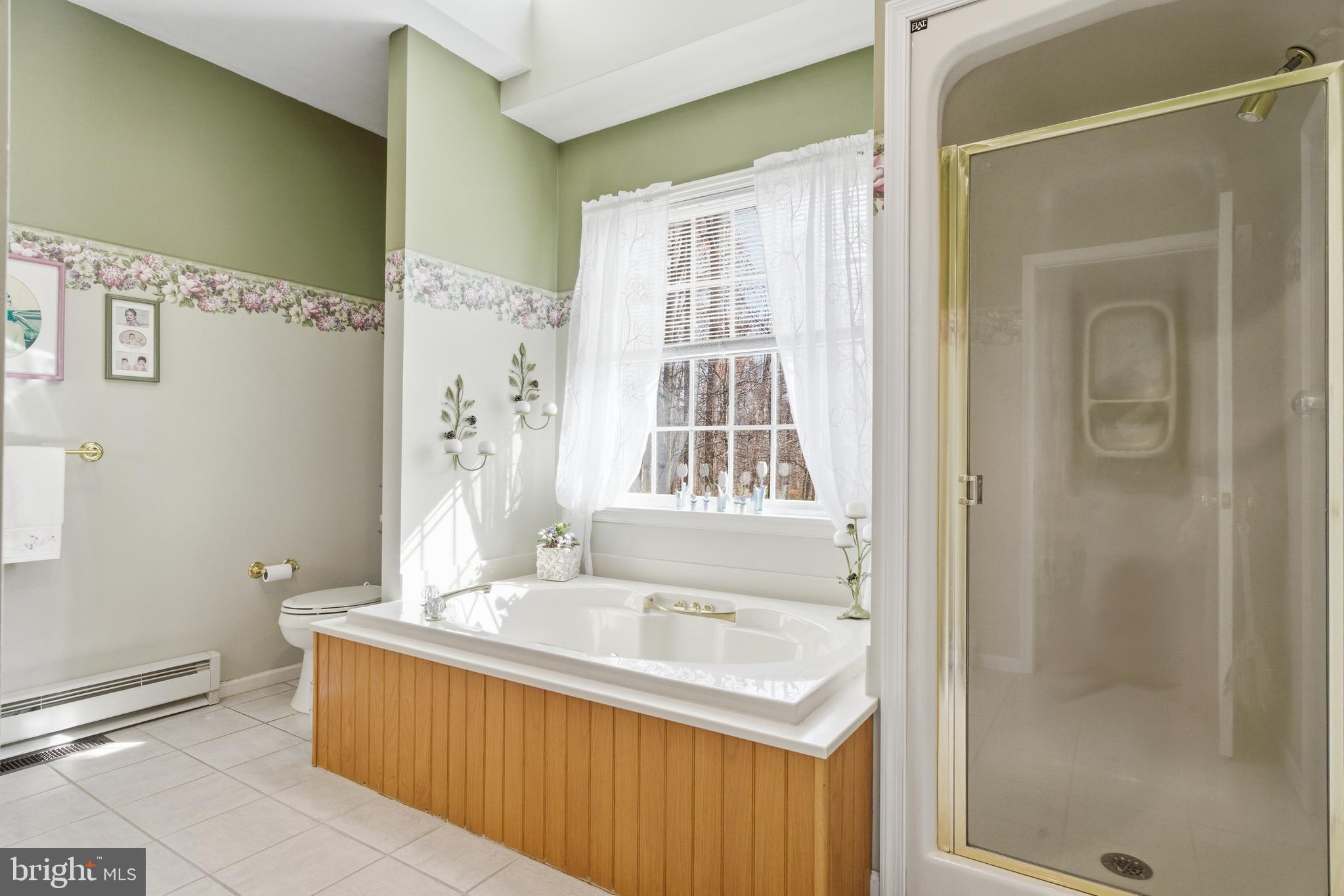 52 Harrisburg School Road Quakertown, PA 18951 - Photo 21 of 32 a bathroom with a granite countertop sink a mirror and a shower