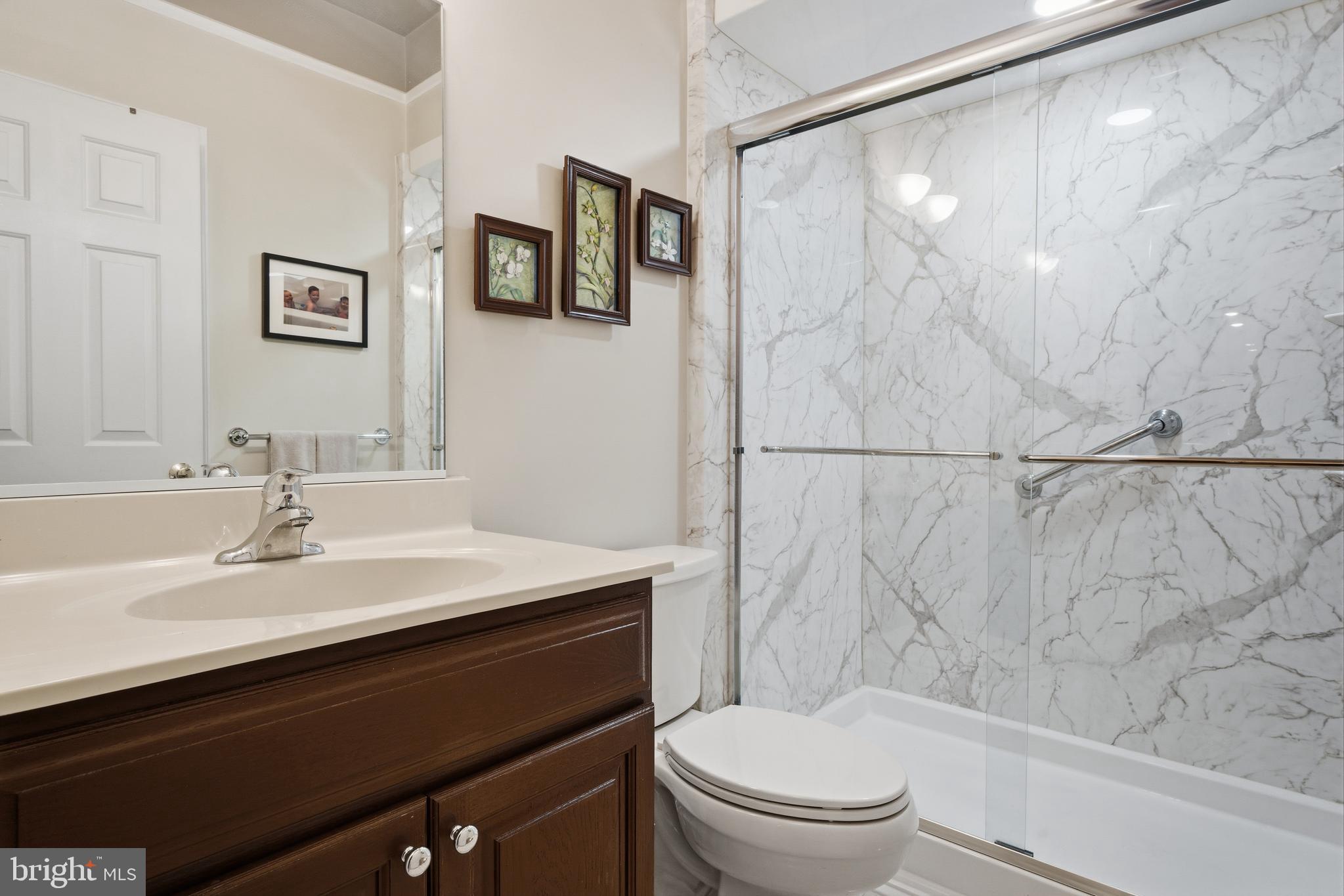 52 Harrisburg School Road Quakertown, PA 18951 - Photo 25 of 32 a bathroom with a sink a toilet and shower