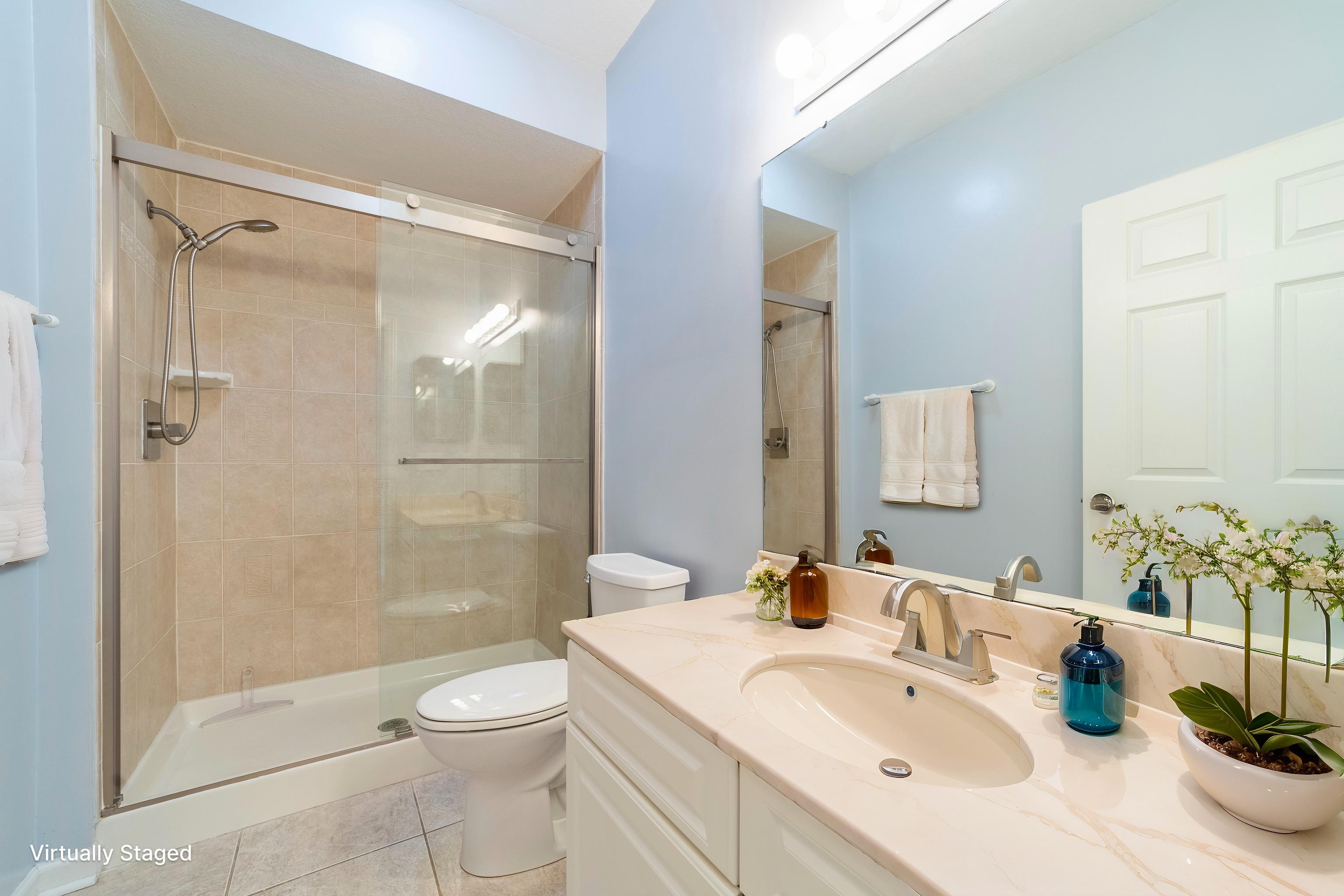 3225 Haley Pointe Road St. Augustine, FL 32084 - Photo 11 of 35 a bathroom with a sink a toilet and shower