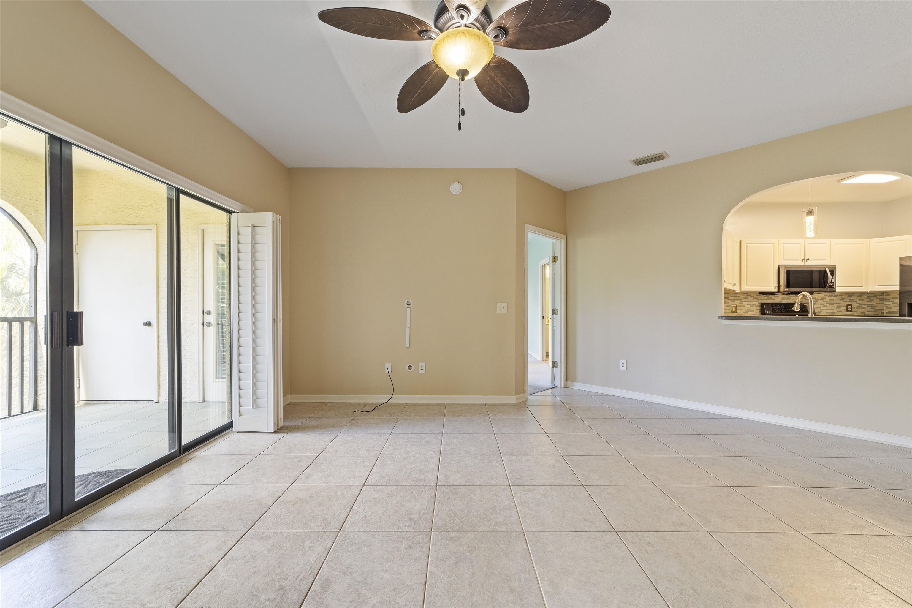 3225 Haley Pointe Road St. Augustine, FL 32084 - Photo 19 of 35 a view of an empty room and window with a ceiling fan