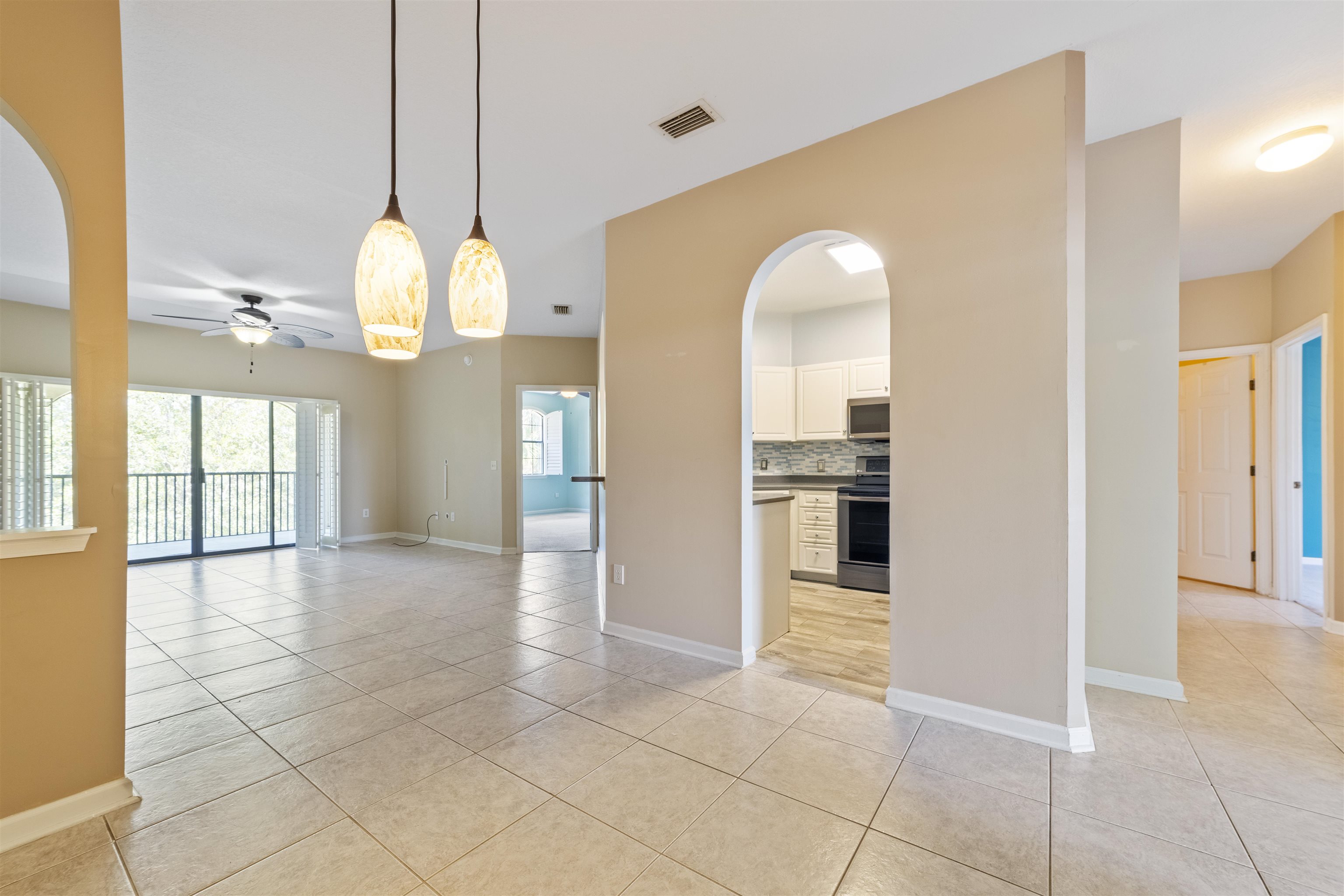 3225 Haley Pointe Road St. Augustine, FL 32084 - Photo 20 of 35 a view of a kitchen with a sink and an entryway