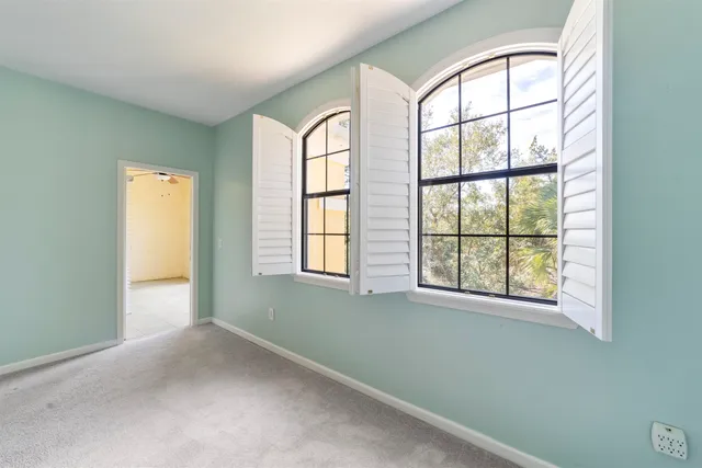 a bathroom with a bathtub and a toilet