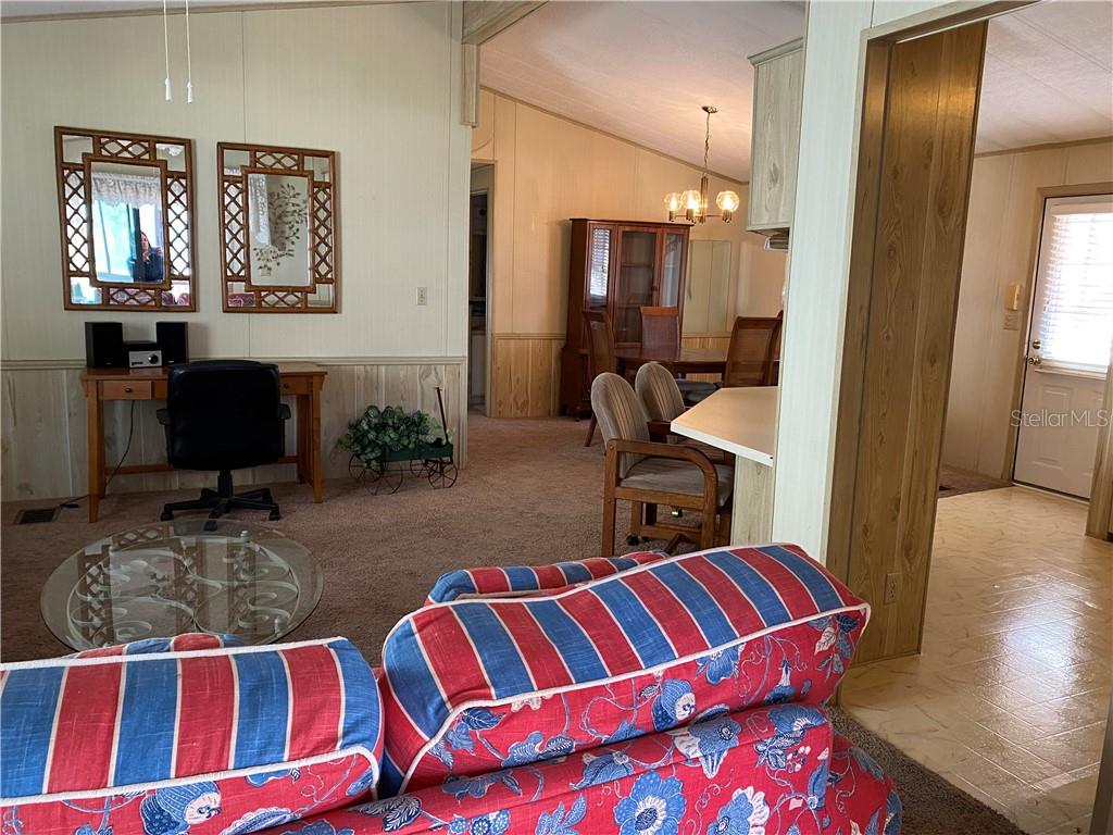 3 Meadow Circle Ellenton, FL 34222 - Photo 12 of 17 a bedroom with furniture and a wooden floor