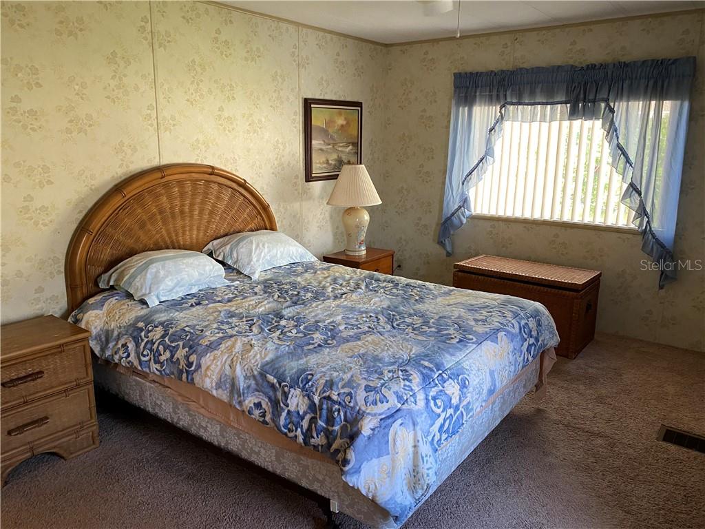 3 Meadow Circle Ellenton, FL 34222 - Photo 9 of 17 a bedroom with a bed and window