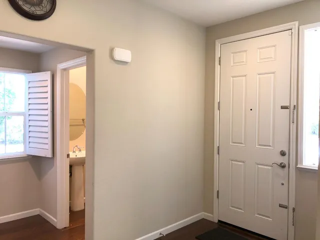 a bathroom with a sink a mirror and a shower