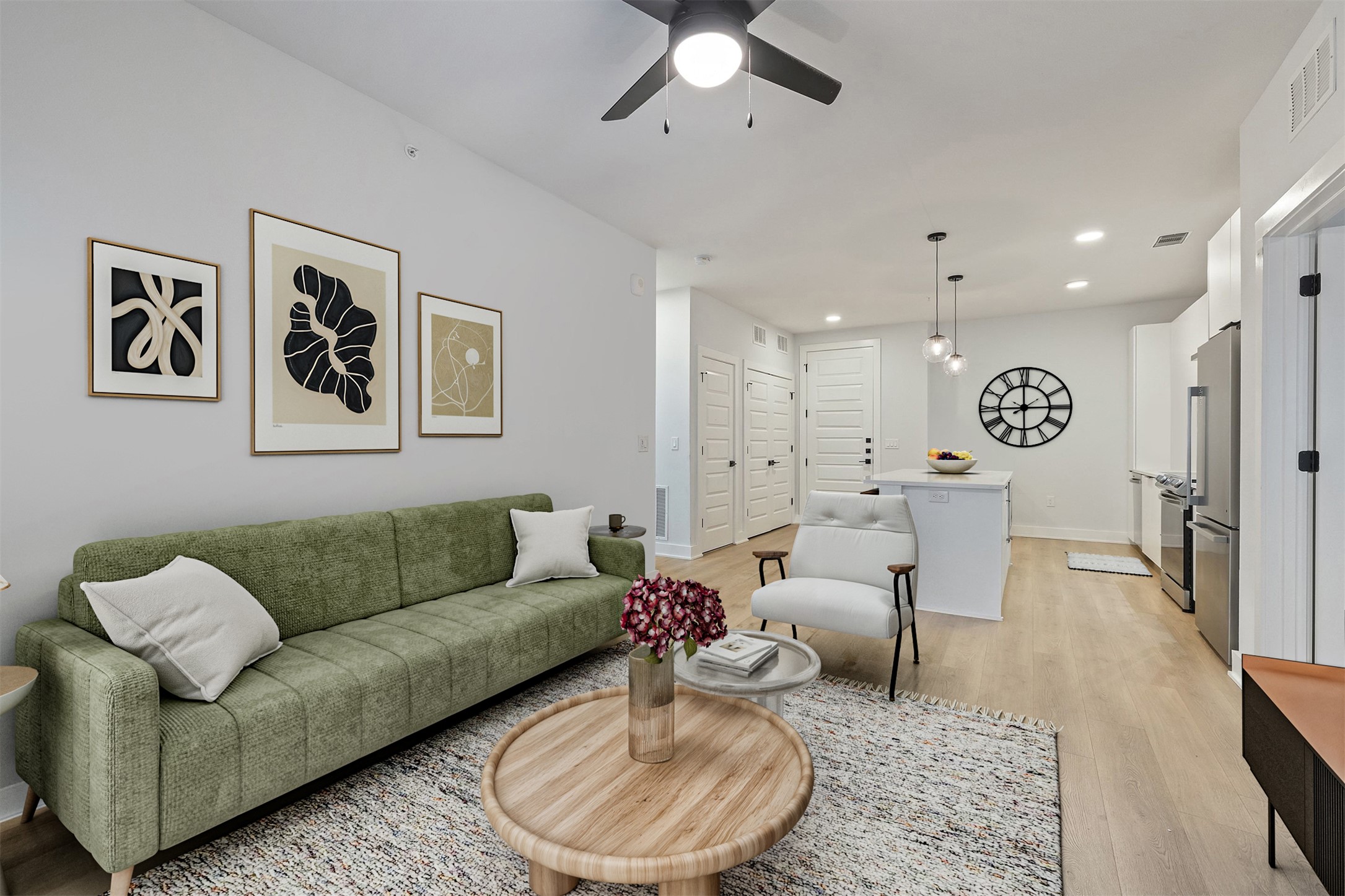 2500 Longview Street, Unit 418 Austin, TX 78705 - Photo 12 of 40 Living area with light wood-style flooring, recessed lighting, and ceiling fan