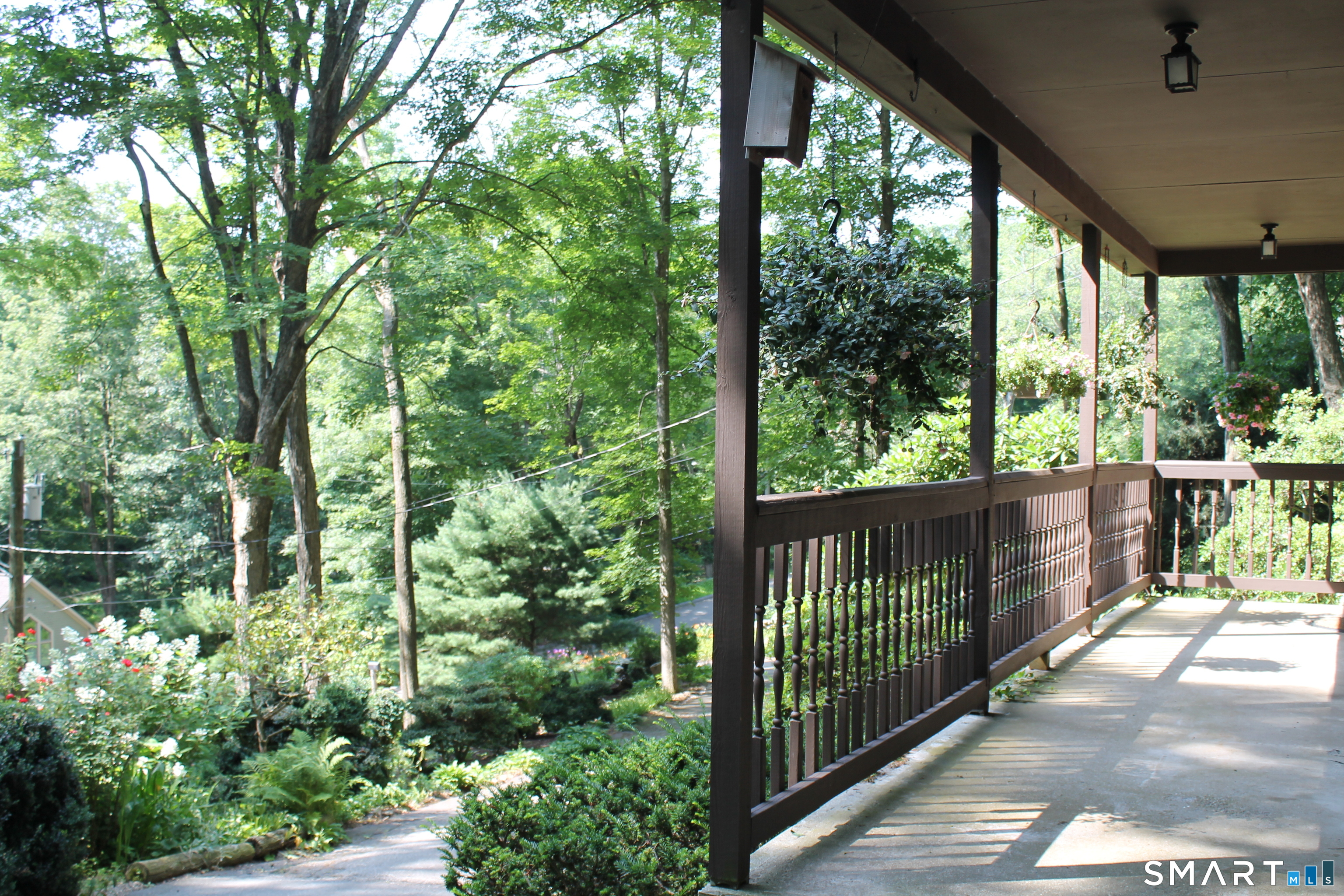 35 Pigeon Swamp Road, Unit 2 Lebanon, CT 06249 - Photo 4 of 35 a view of a balcony with trees