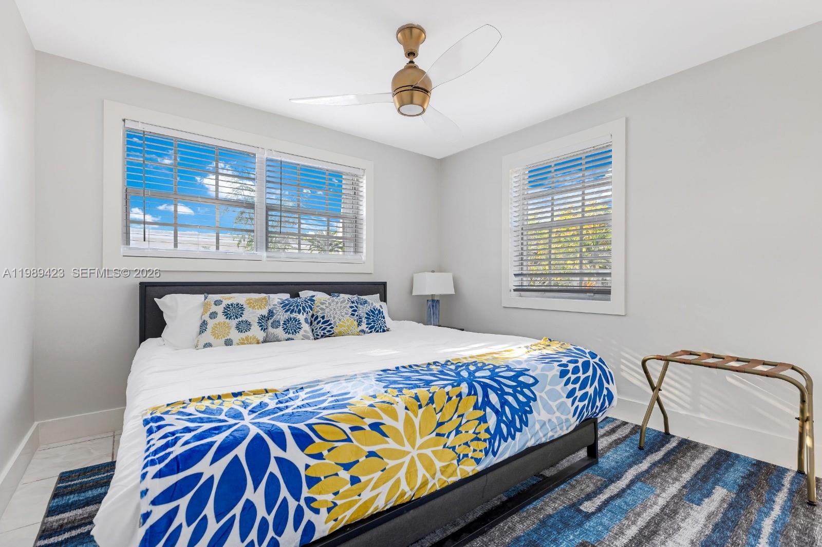 38 Miami Gardens Road West Park, FL 33023 - Photo 20 of 30 a bedroom with a bed and a window